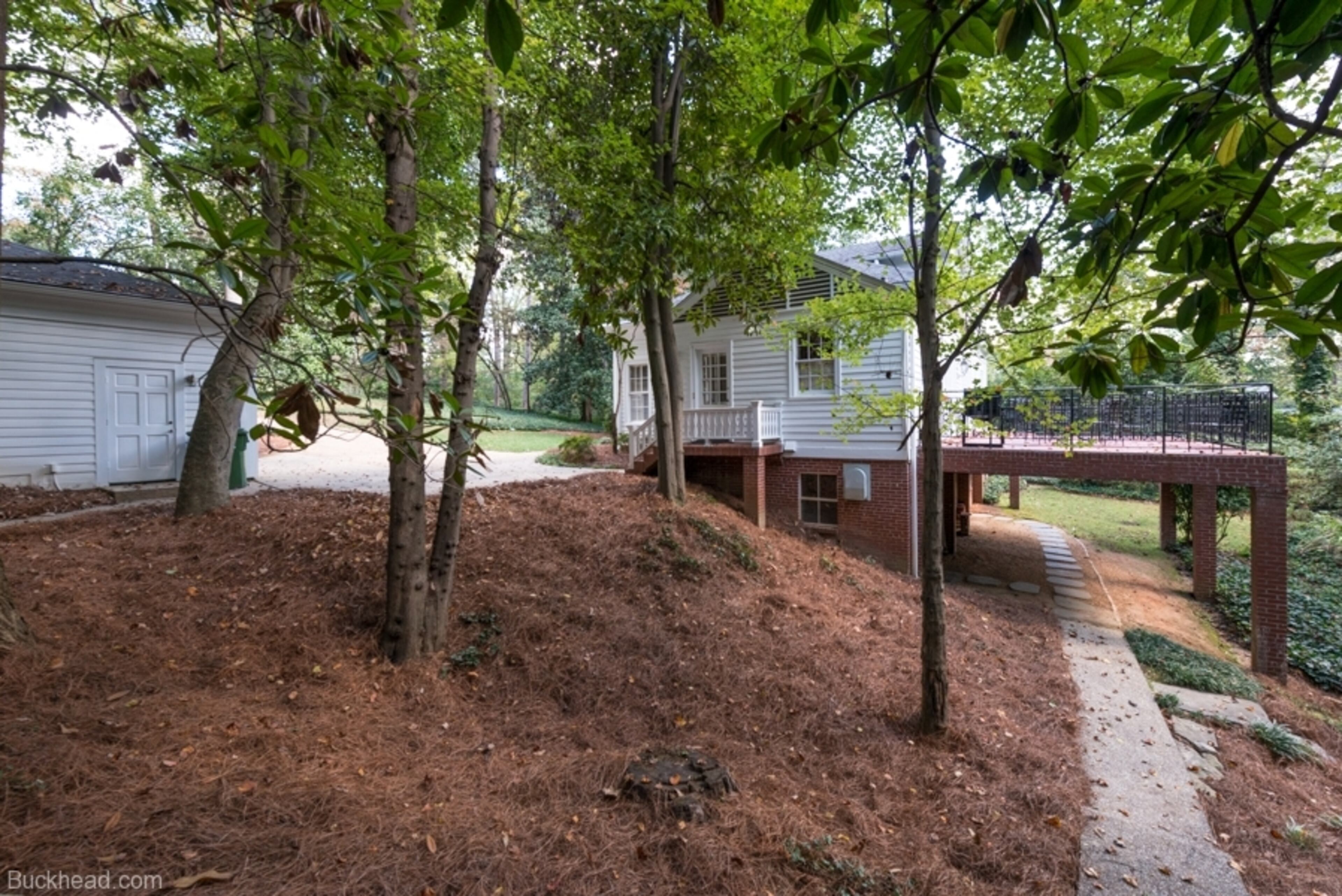 Believed to be the oldest home in Buckhead, this pre-Civil War home, located at 1450 W. Wesley Road, was likely built some time in the 1830s. It's on the market again with an asking price of $1,299,000. Photos courtesy of Buckhead.com.