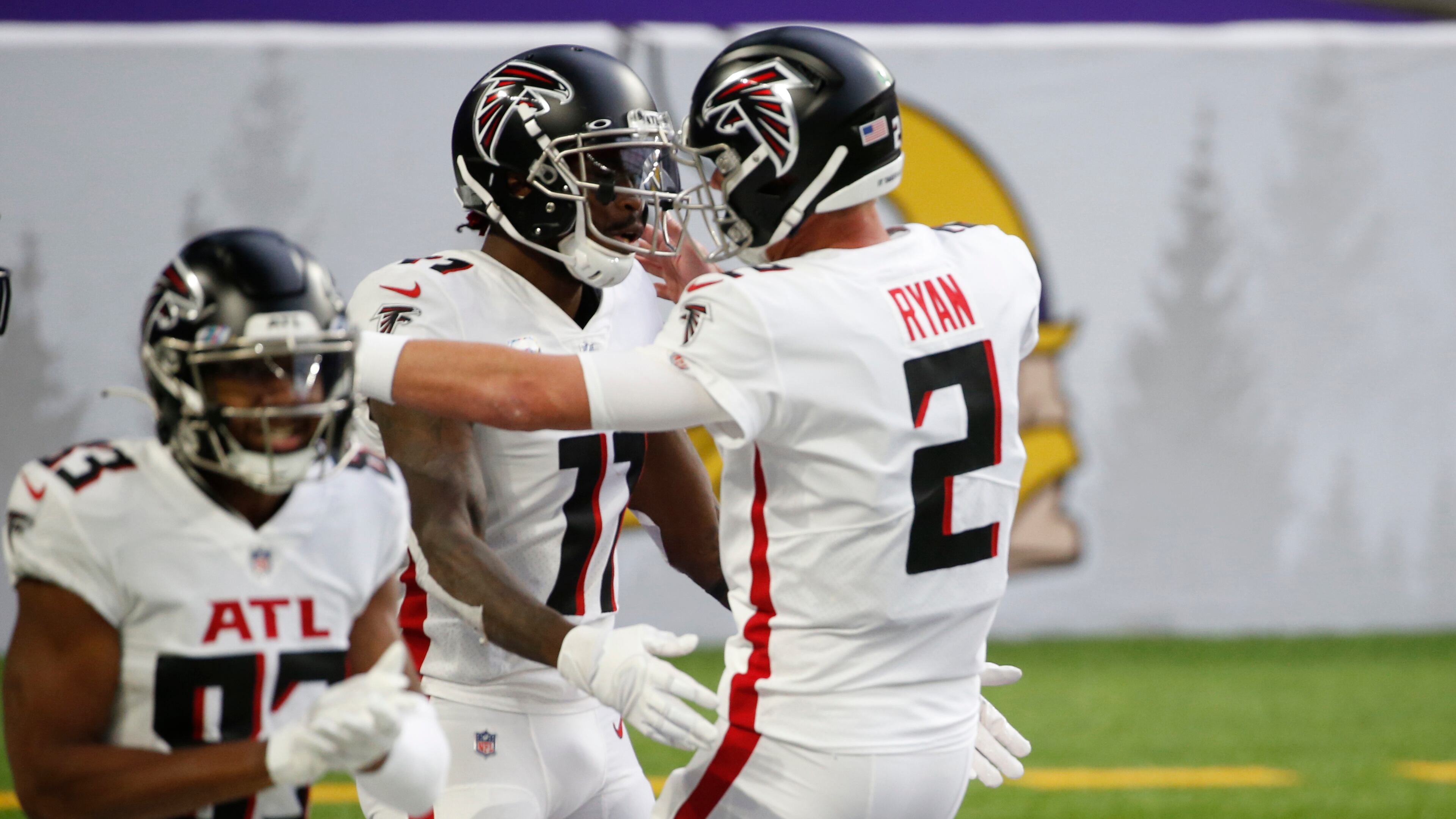 Atlanta Falcons wide receiver Julio Jones, left, celebrates with quarterback Matt Ryan (2) after catching a 20-yard touchdown pass during the first half against the Minnesota Vikings, Sunday, Oct. 18, 2020, in Minneapolis. (Bruce Kluckhohn/AP)