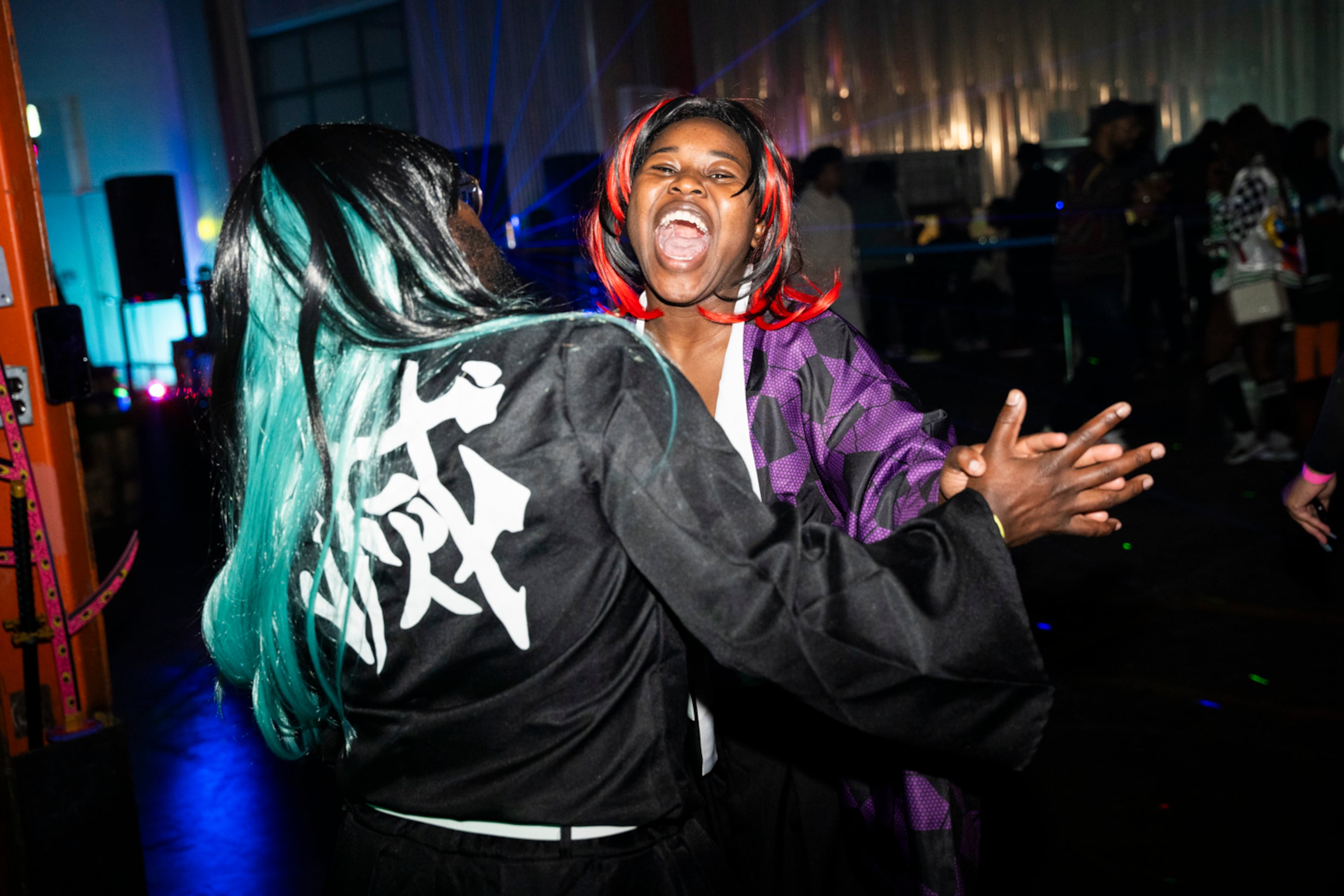 Party guests enjoy the high energy environment at Cxmmunity Media's partnership with local event brand Trap Sushi at Monday Night Garage in Atlanta on Feb. 23, 2024. (Olivia Bowdoin for the AJC).
