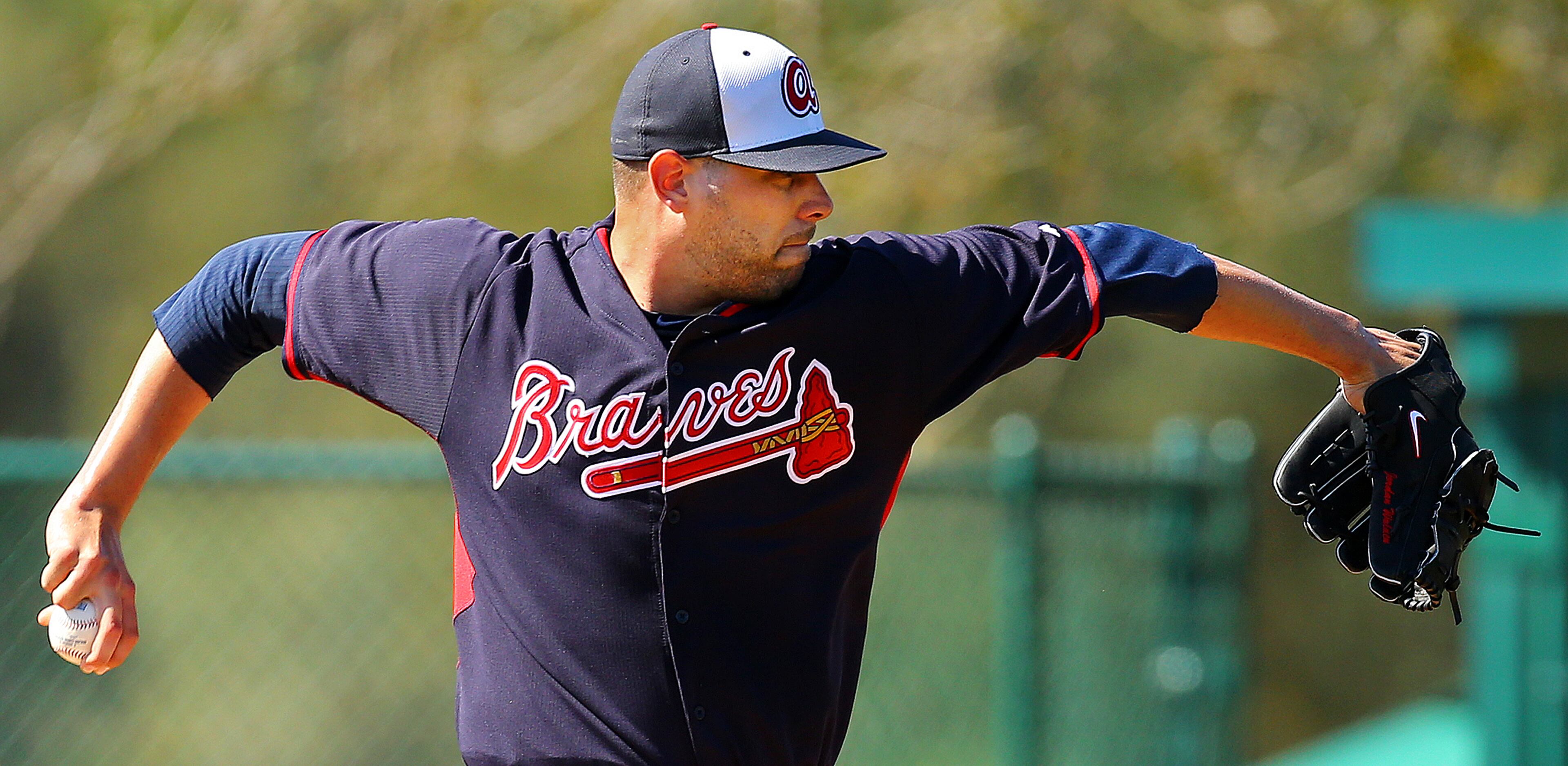 Jordan Walden delivers a pitch at spring training on Thursday, Feb. 20, 2014, in Lake Buena Vista, FL.