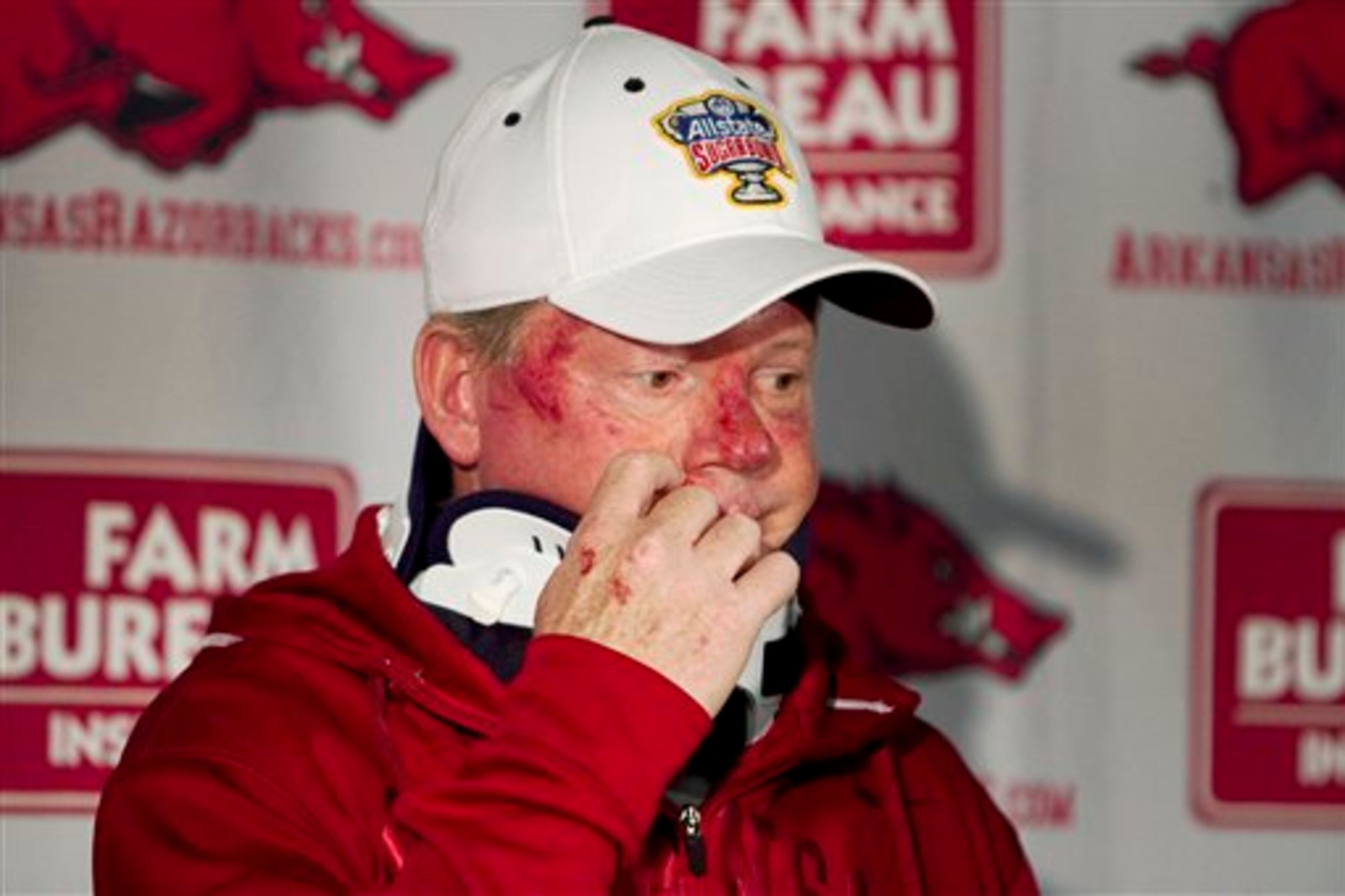 In this Tuesday, April 3, 2012, photo, Arkansas football coach Bobby Petrino speaks during a news conference in Fayetteville, Ark. Petrino has been put on paid leave. Athletic director Jeff Long announced the decision late Thursday, April 5, capping a stunning day in which it was revealed that Petrino had a 25-year-old female employee with him during a weekend motorcycle ride that ended in a crash. (AP Photo/Gareth Patterson)
