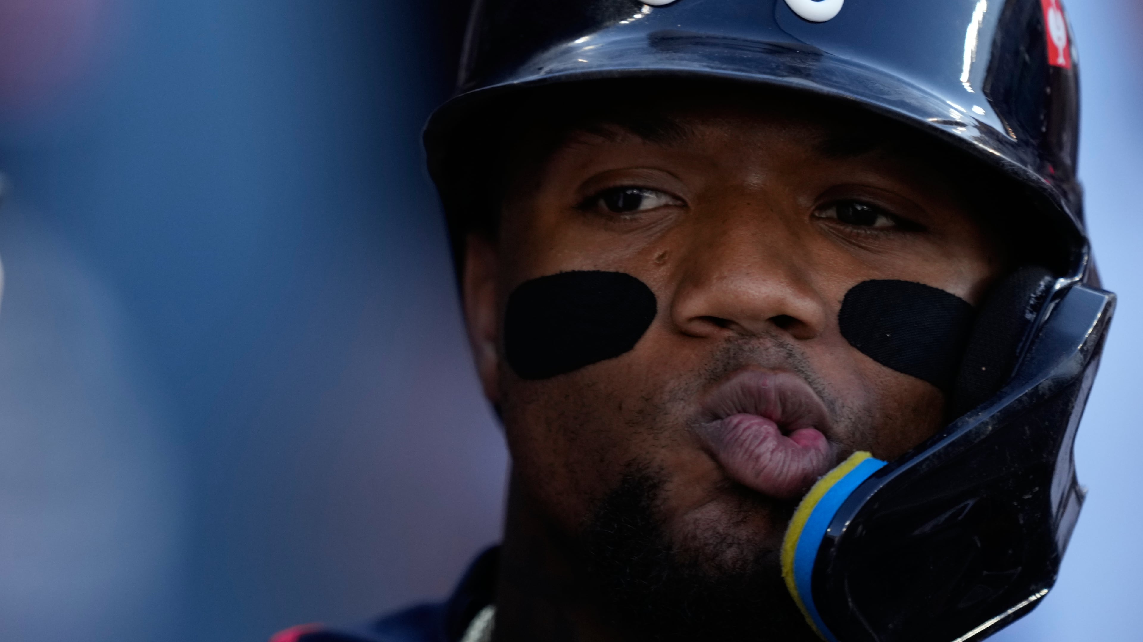 Atlanta Braves' Ronald Acuña Jr. celebrates with teammates after scoring off an RBI single by Mauricio Dubón during the first inning of Game 2 of a National League Division Series baseball game against the Los Angeles Dodgers Sunday, Oct. 4, 2026, in Los Angeles. (AP Photo/Mark J. Terrill)