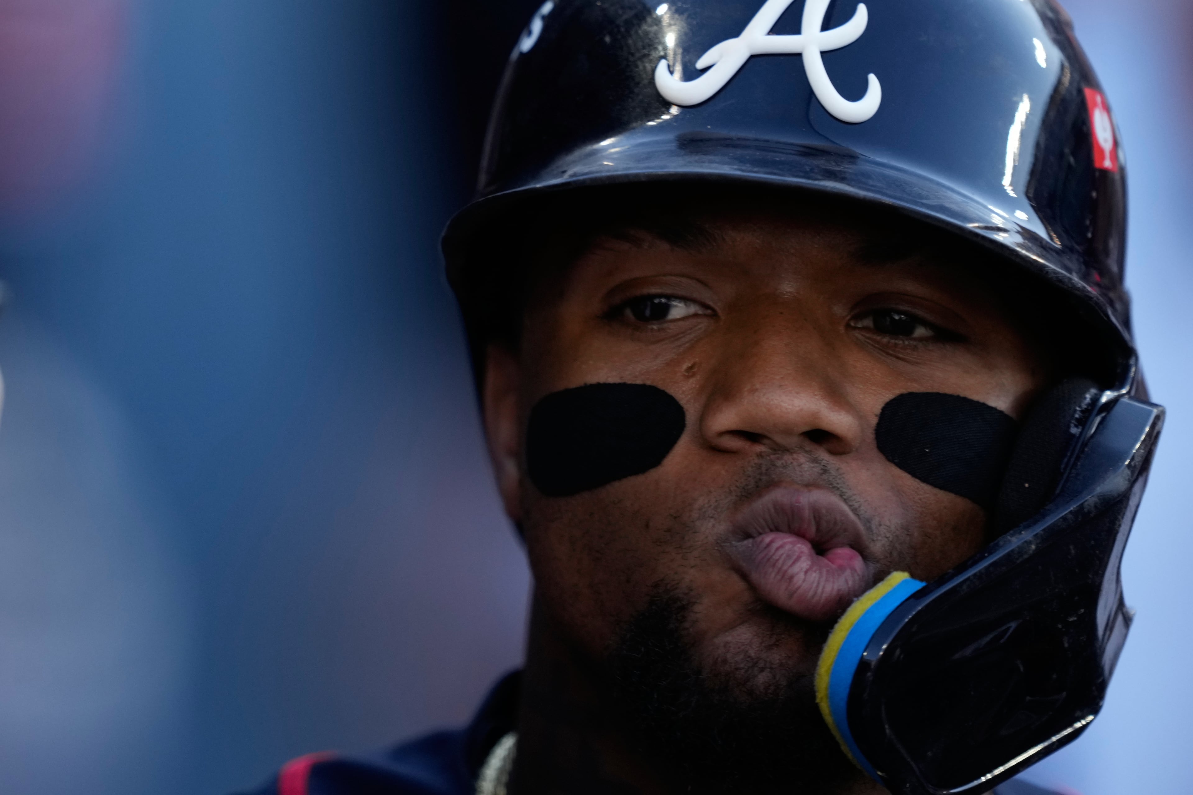 Ronald Acuña Jr. is actually celebrating here, after scoring a run in Game 2. (Mark J. Terrill/AP)