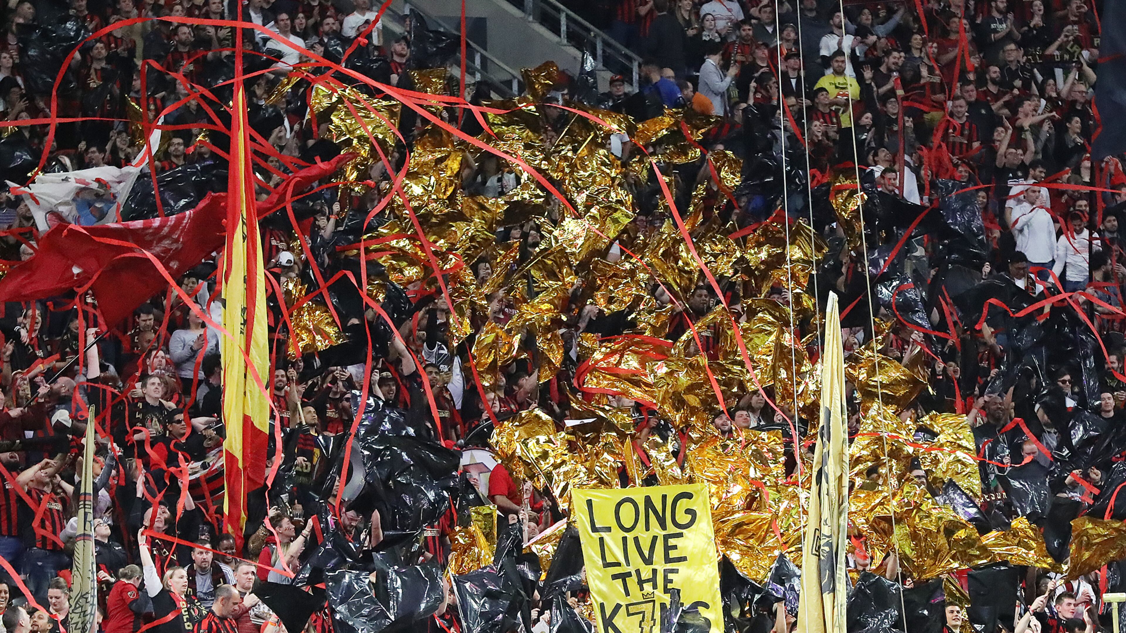 March 8, 2020 Atlanta: Atlanta United fans wave gold flags in honor of injured player Josef Martinez to start the home opener against FC Cincinnati in a MLS soccer match on Saturday, March 8, 2020, in Atlanta. Curtis Compton ccompton@ajc.com