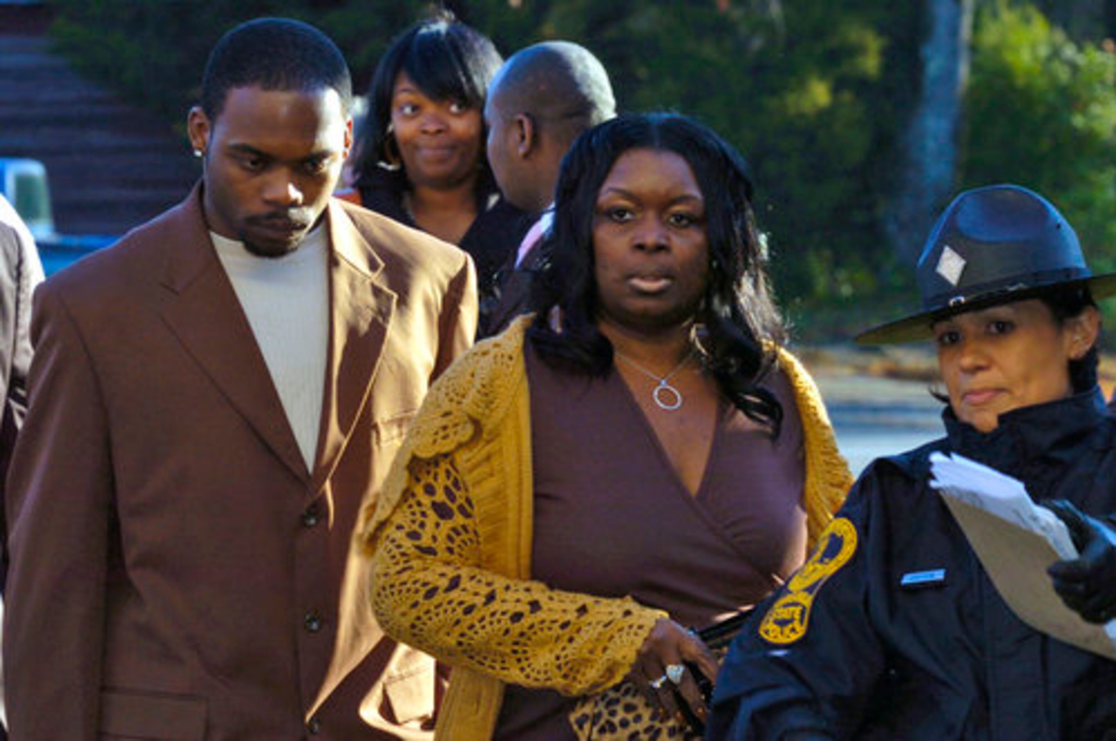 Marcus Vick and Brenda Boddie, the brother and mother of former NFL quarterback Michael Vick, arrive at court Tuesday. In a plea agreement that was signed before his court appearance, Michael Vick will receive a three-year suspended prison term and a $2,500 fine. He also received four years probation. The fine will be suspended if Vick pays court costs and maintains good behavior for four years.