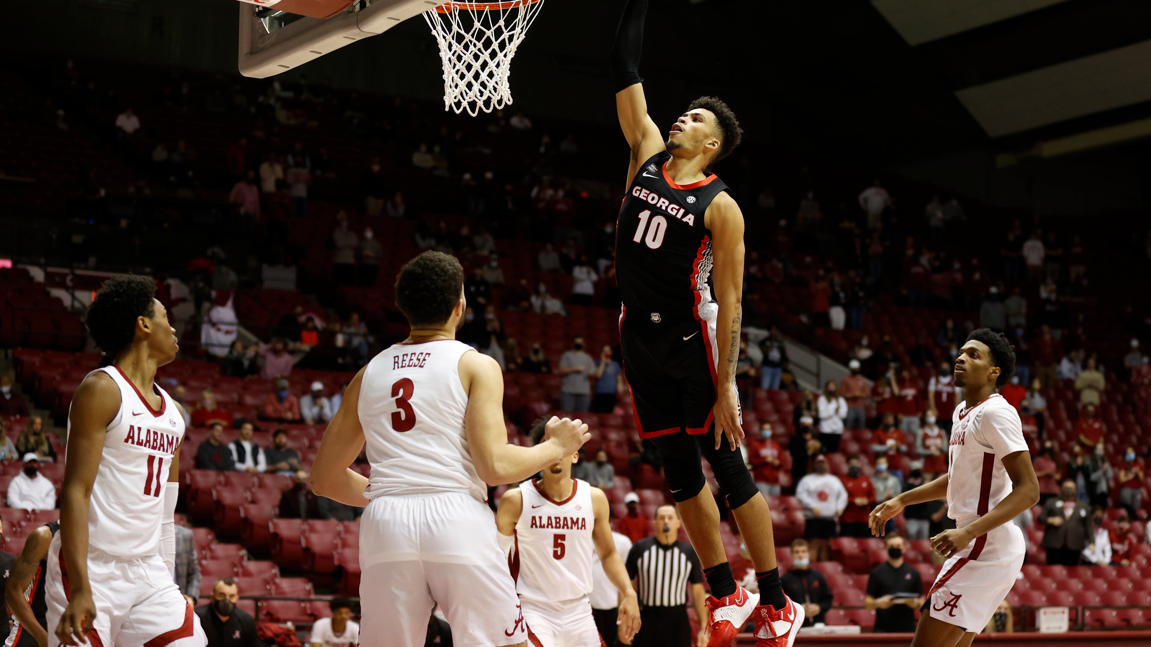 Georgia's Toumani Camara dunks against Alabama on Feb. 13, 2021 at Coleman Coliseum in Tuscaloosa, Ala. (Photo by Crimson Tide Photos)