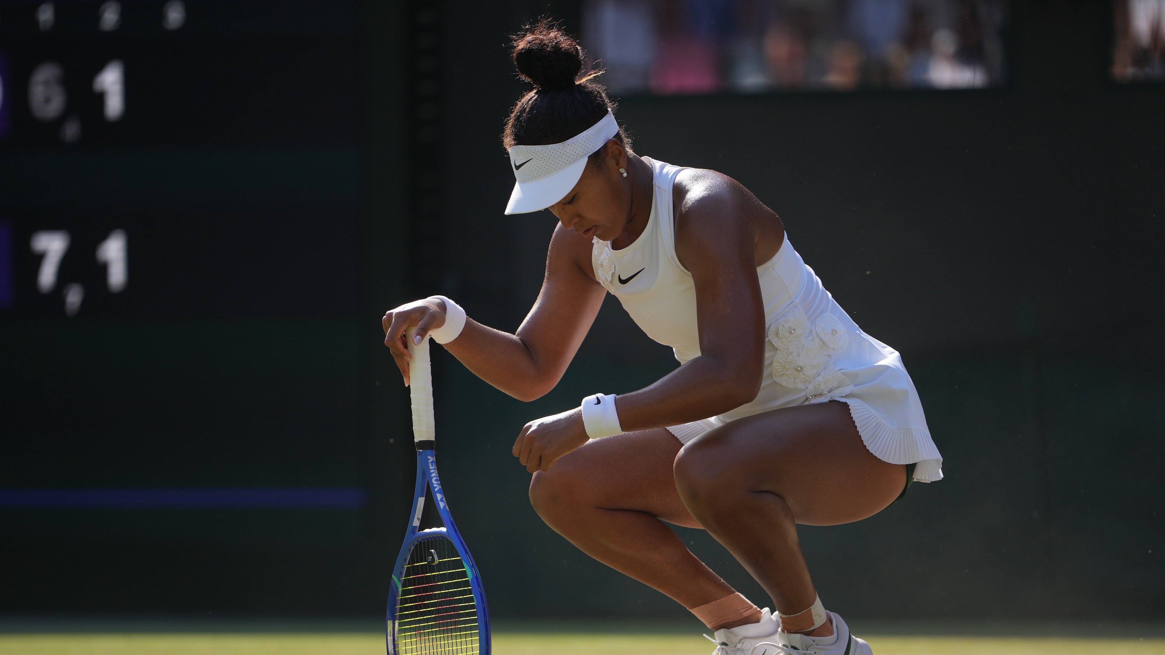 Naomi Osaka of Japan reacts to losing a point against Karolina Muchova of Czech Republic in their quarter-final women's singles match at the Wimbledon Tennis Championships in London, Tuesday, July 7, 2026. (AP Photo/Kin Cheung)