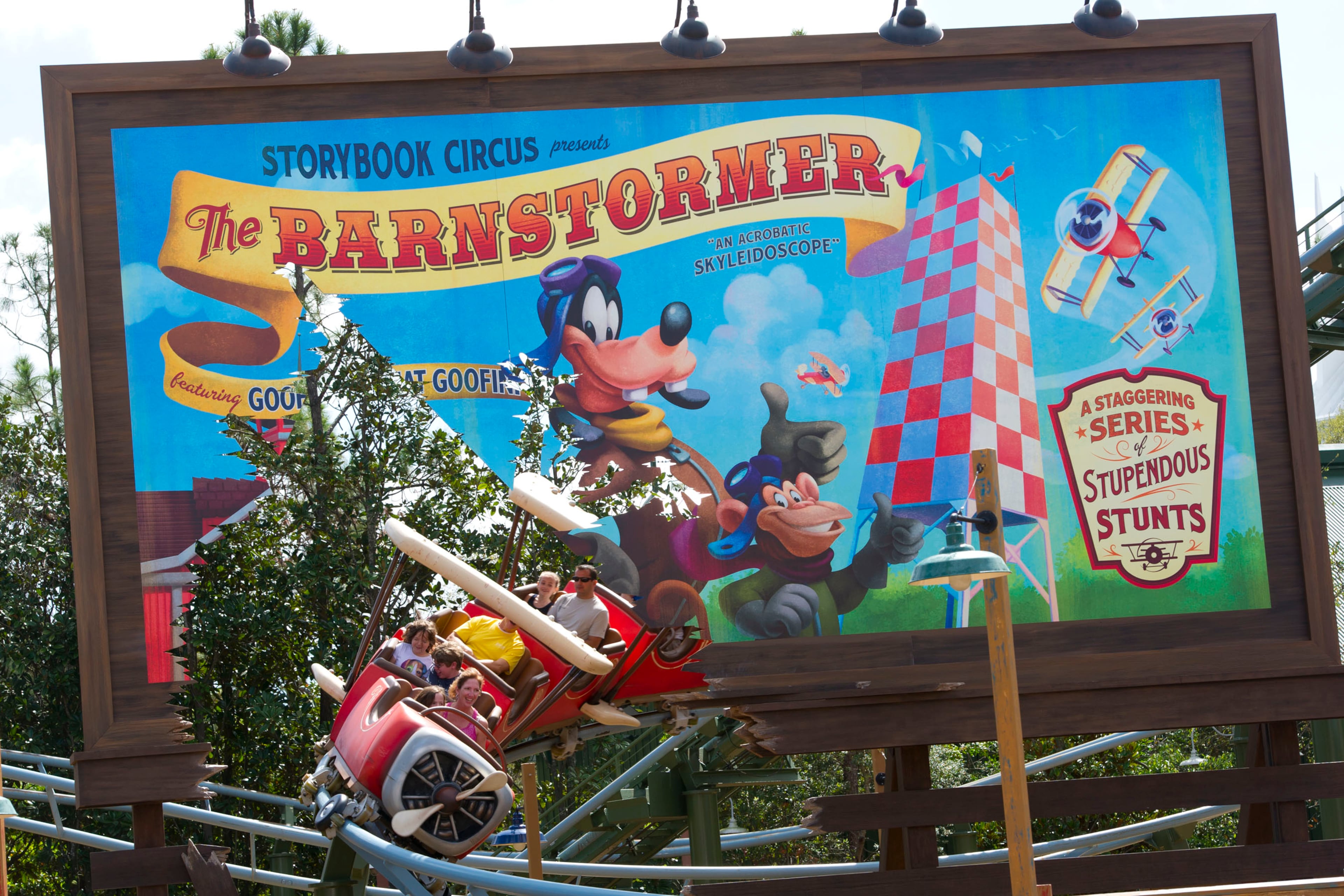 Guests take flight with Goofy on "The Barnstormer" featuring The Great Goofini, a family coaster attraction featuring Mickey's best pal---and the circus' stuntman---in his very own aerial acrobatics act. Located in Storybook Circus, the Barnstormer is part of New Fantasyland, a multiyear project and the largest expansion in Magic Kingdom history.