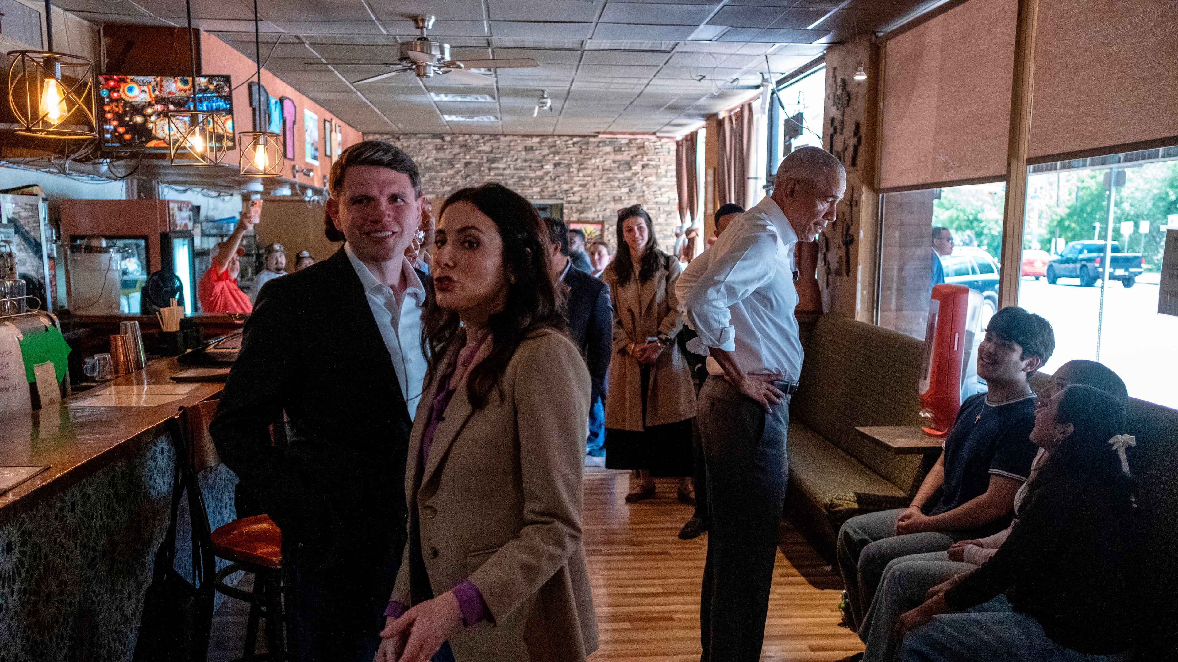 Texas Democratic Senate candidate and Texas state Rep. James Talarico, Texas Democratic gubernatorial candidate Gina Hinojosa and former President Barack Obama visit the Taco Joint on Tuesday, May 12, 2026, in Austin, Texas. (AP Photo/Joel Angel Juarez, Pool)