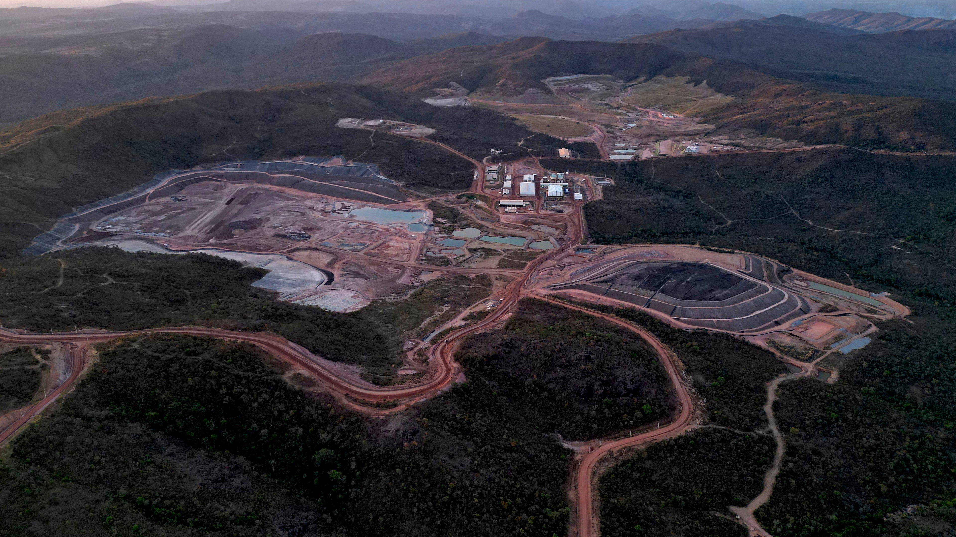 FILE - A mine operated by Serra Verde Mining digs for rare earth elements including neodymium, praseodymium, terbium and dysprosium, which are essential for the production of permanent magnets, in Minacu, Goias state, Brazil, July 28, 2025. (AP Photo/Eraldo Peres, File)