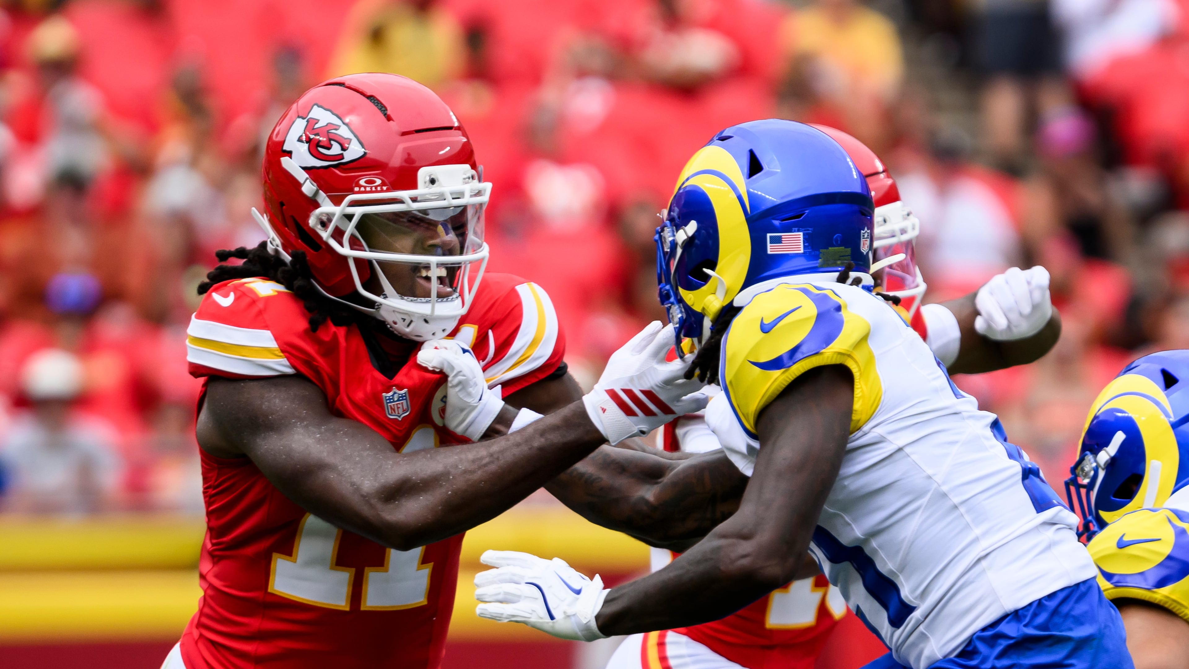 Chiefs wide receiver Jalen Royals (left) blocks against the Rams during a preseason game in August. Royals is one of six NFL players from Hillgrove High in Powder Springs. (AP Photo/Reed Hoffmann)