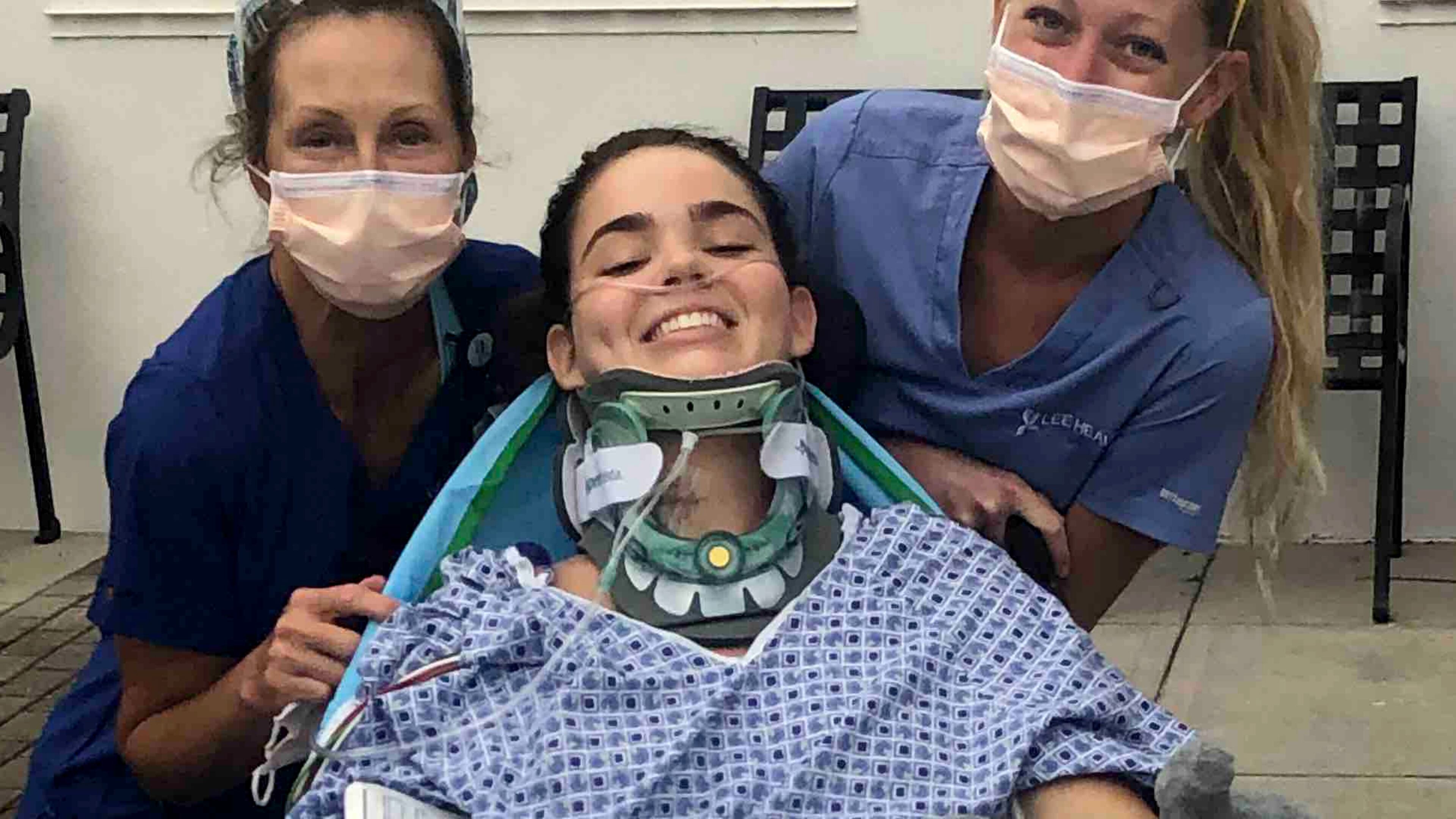 Eden Schroeder, shown with two of her nurses in a Florida hospital, will be transferred to the Shepherd Center in Atlanta on Thursday.