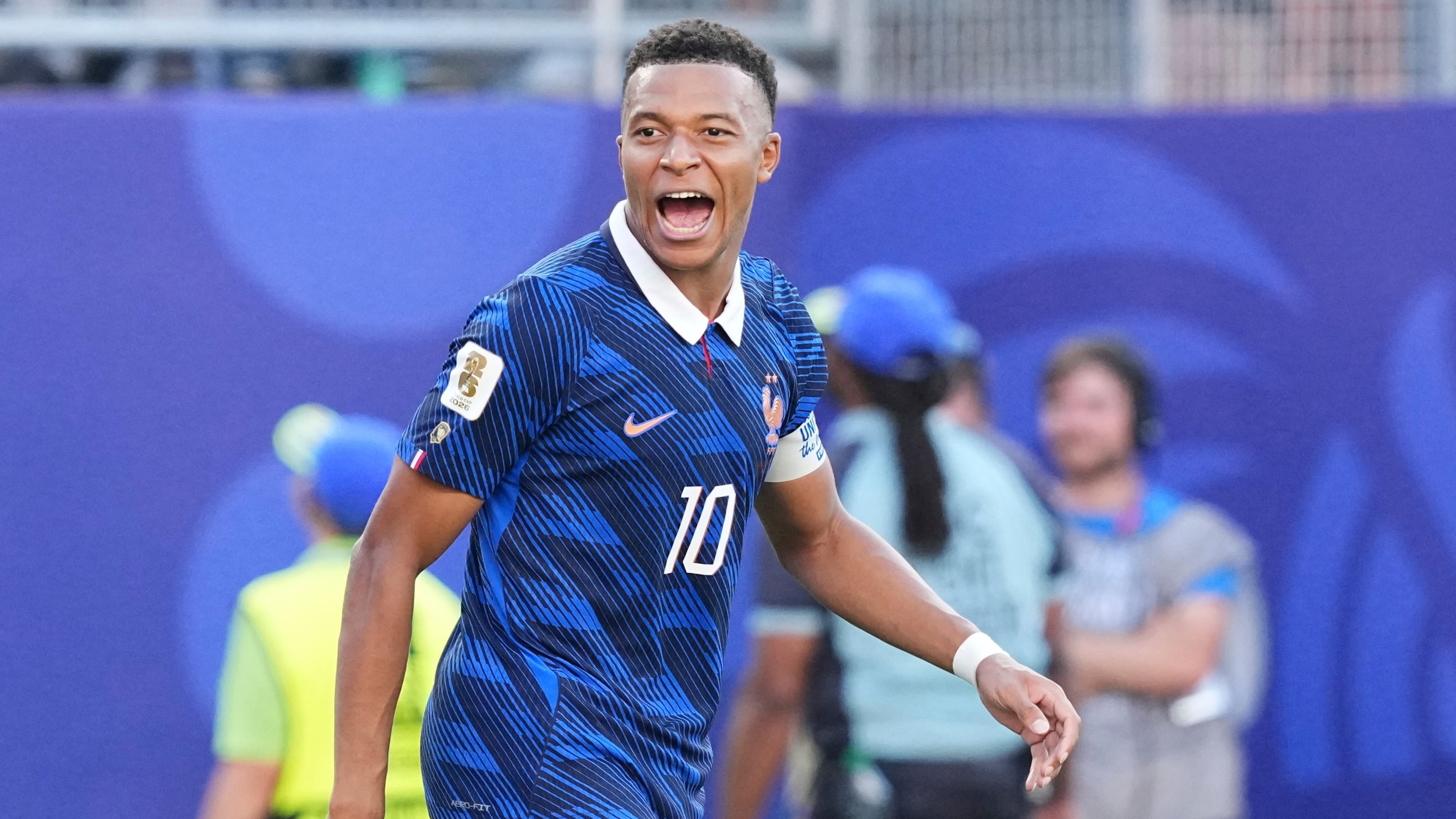 France's Kylian Mbappe (10) celebrates after scoring from a penalty kick the opening goal during the World Cup round of 16 soccer match between Paraguay and France in Philadelphia, Saturday, July 4, 2026. (AP Photo/Martin Meissner)