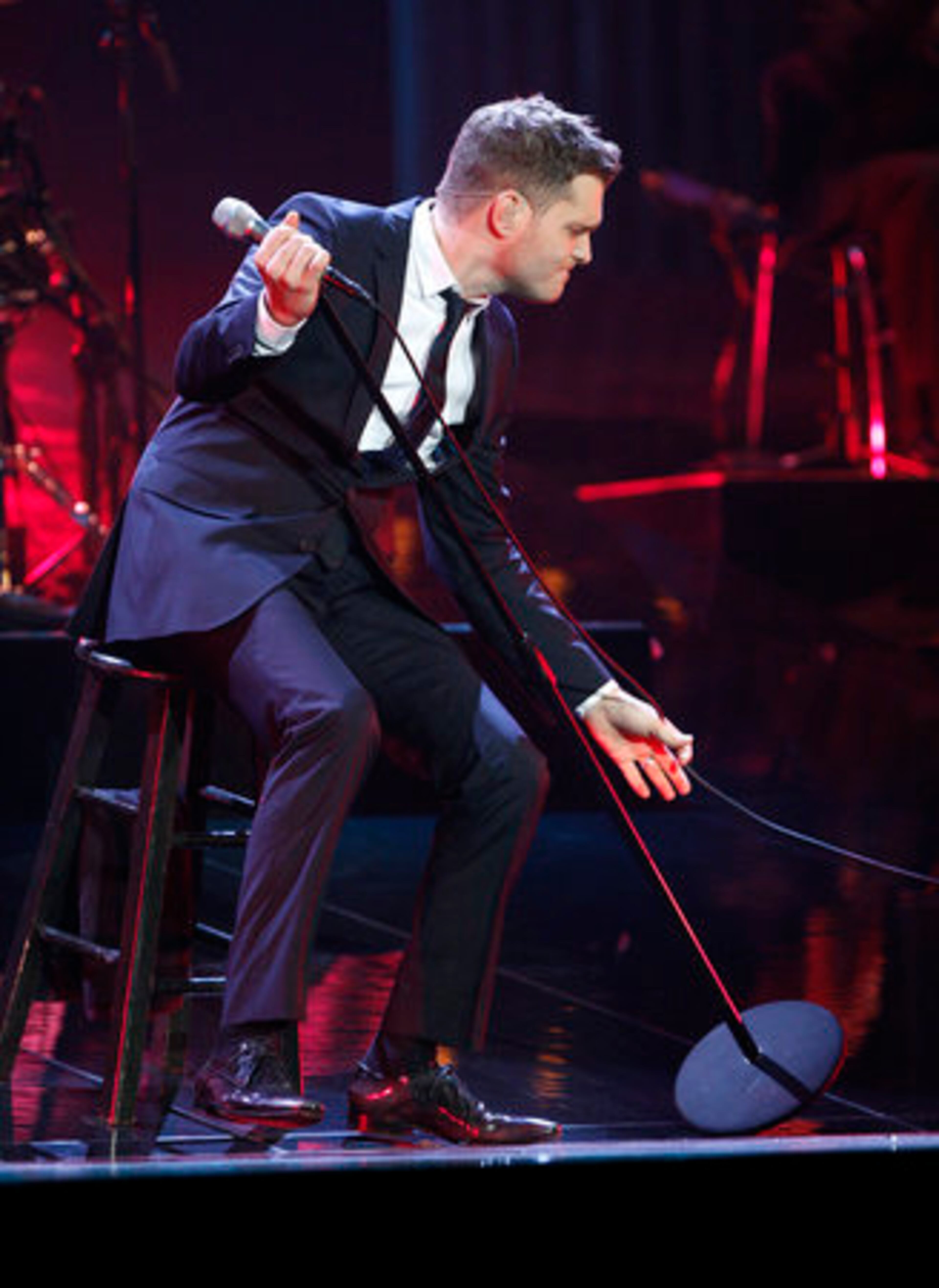 Michael Bubl begins to groove while still seated.