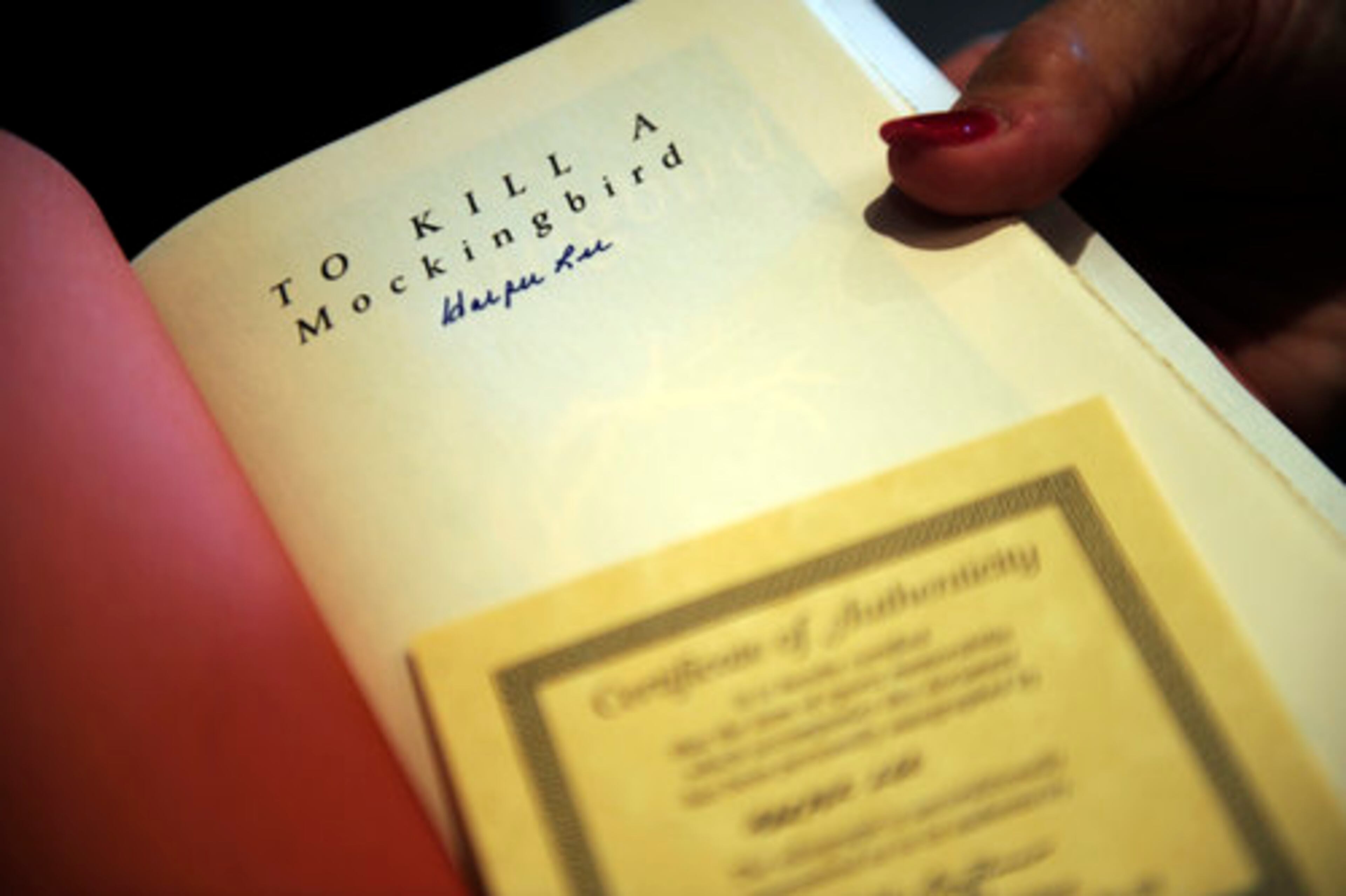 Marie displays her husband's precious book, a copy of "To Kill a Mockingbird" signed by Harper Lee. Barnes loves this book "because of Atticus Finch," he says, whom he calls "the ideal lawyer" who sets the standard for others to follow. Plus, he says, Atticus has a daughter who narrates the story, and Barnes practices law with his daughter Allison. The novel is "so much about the South and heroic lawyers," he says. Clearly, he sees his own hopes and history in its pages.