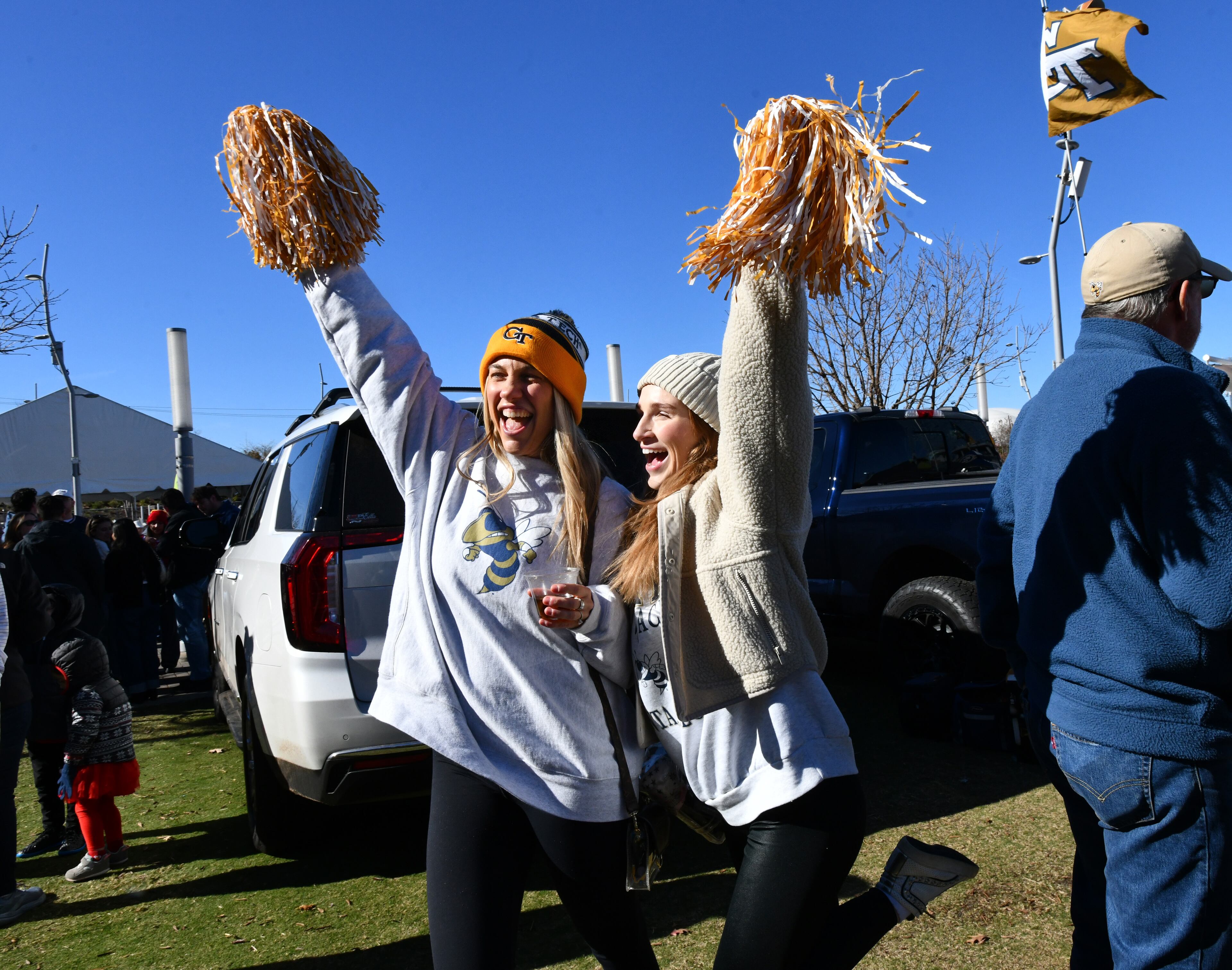 Georgia Tech fans enjoy tailgating at The Home Depot Backyard before the start of the Georgia Tech vs Georgia football game at Mercedes-Benz Stadium, Friday, Nov. 28, 2025 in Atlanta. (Hyosub Shin/AJC)