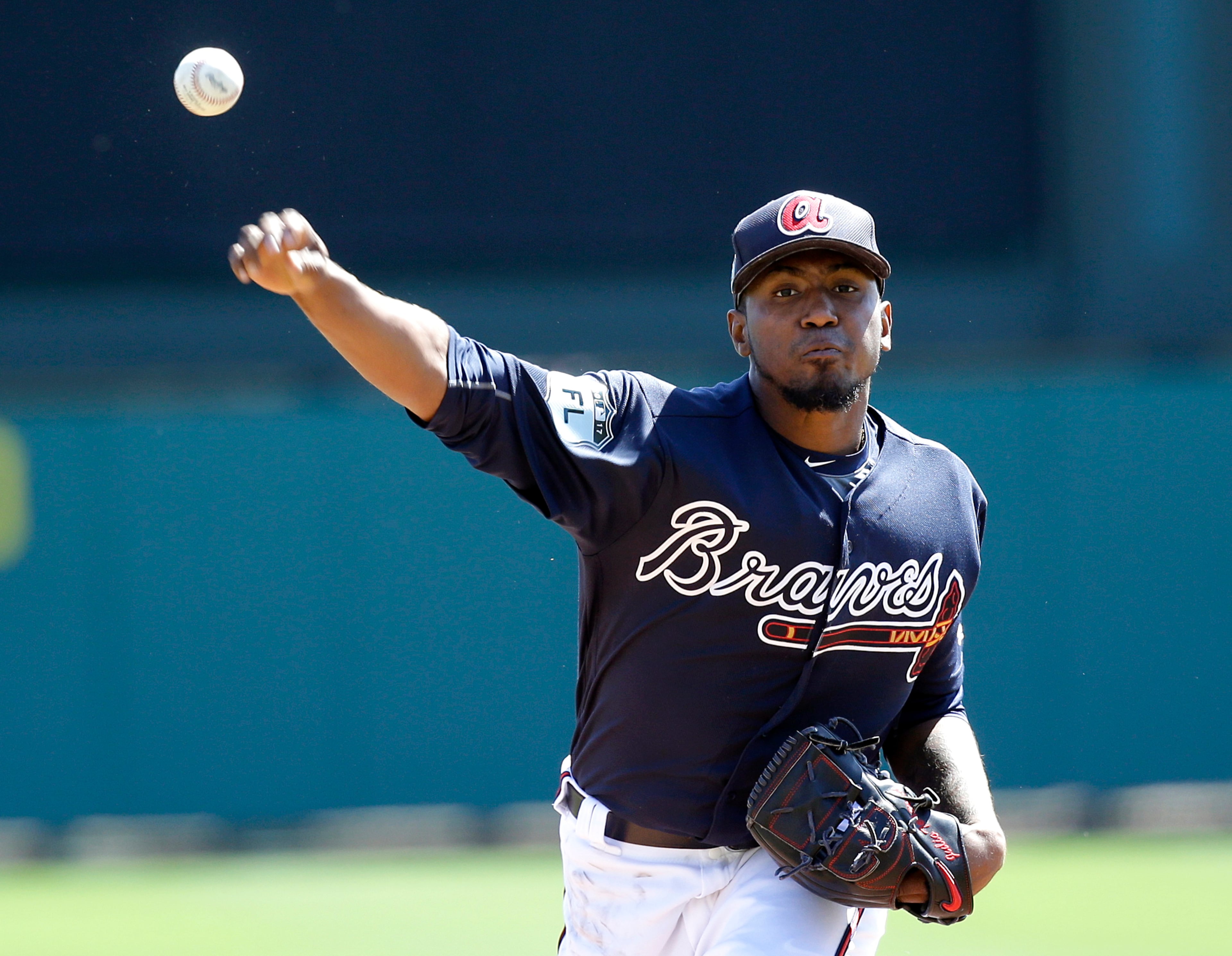 Atlanta Braves starting pitcher Julio Teheran throws in the first inning in a spring training baseball game against the Boston Red Sox, Friday, March 3, 2017, in Kissimmee, Fla. (AP Photo/John Raoux)