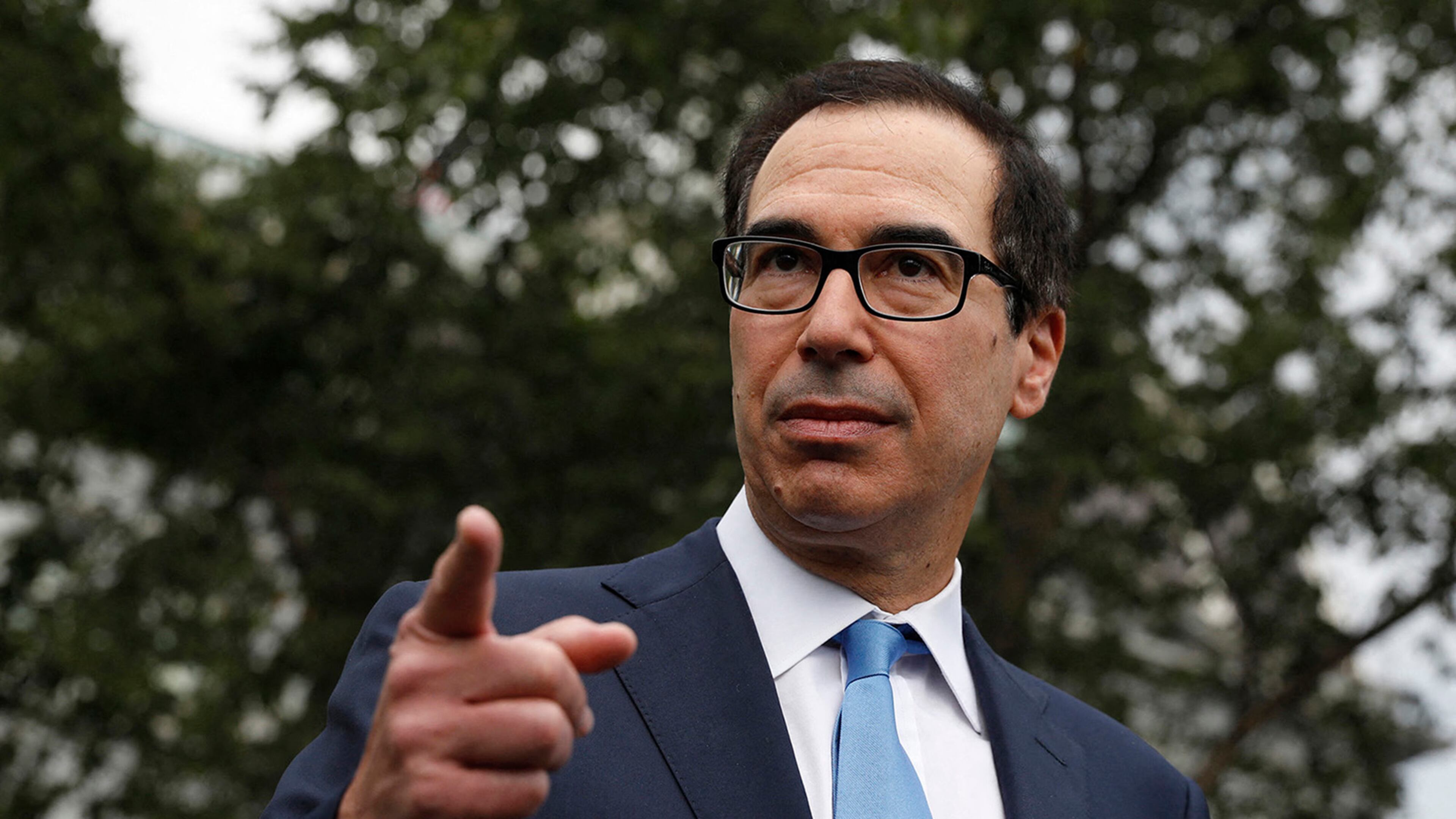 Treasury Secretary Steve Mnuchin speaks to the media on September 9, 2019, outside the White House in Washington, D.C.