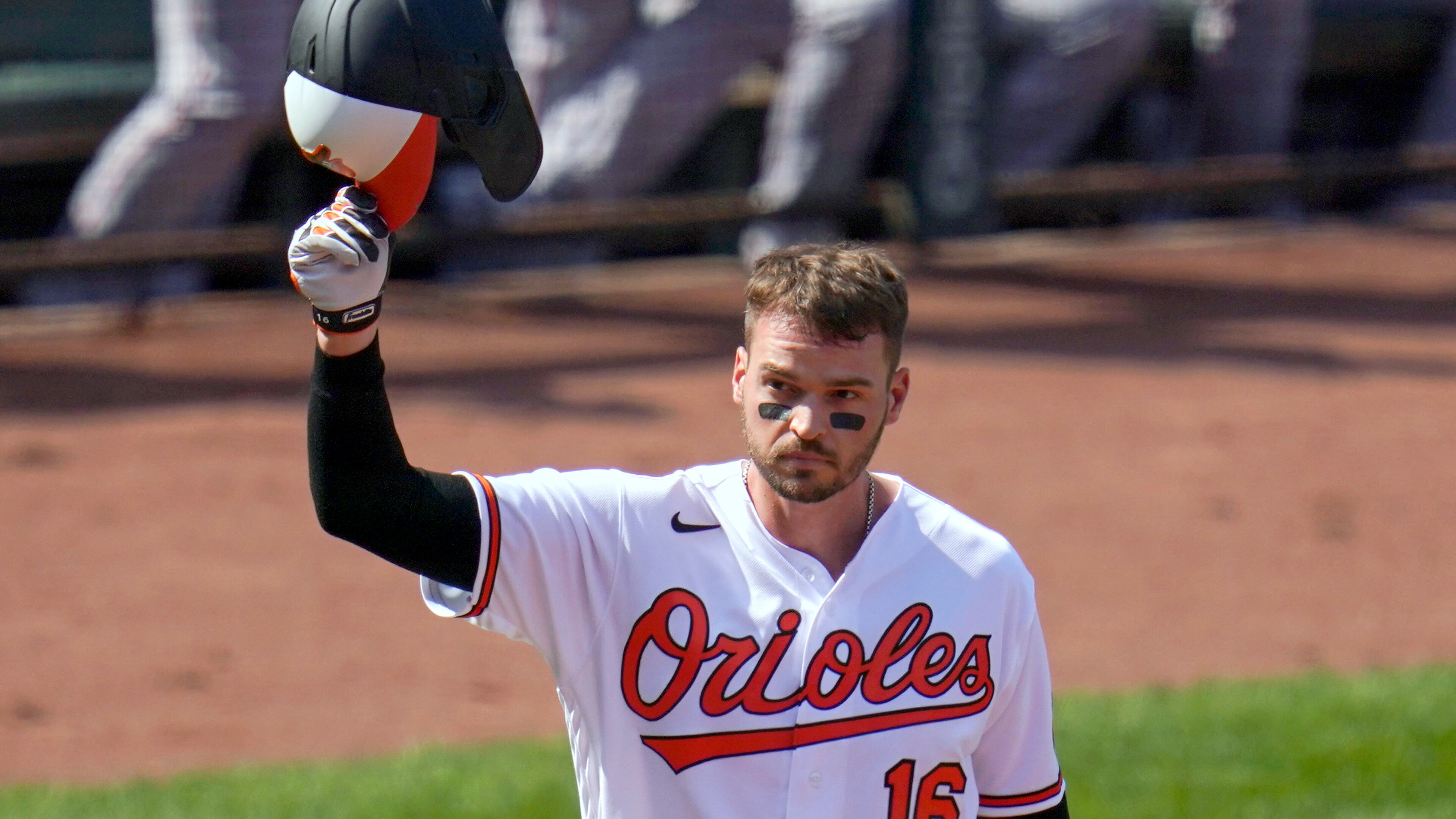 FILE - Baltimore Orioles' Trey Mancini tips his helmet as fans give him a standing ovation prior to a baseball game against the Boston Red Sox, April 8, 2021, on Opening Day in Baltimore. (AP Photo/Julio Cortez, File)