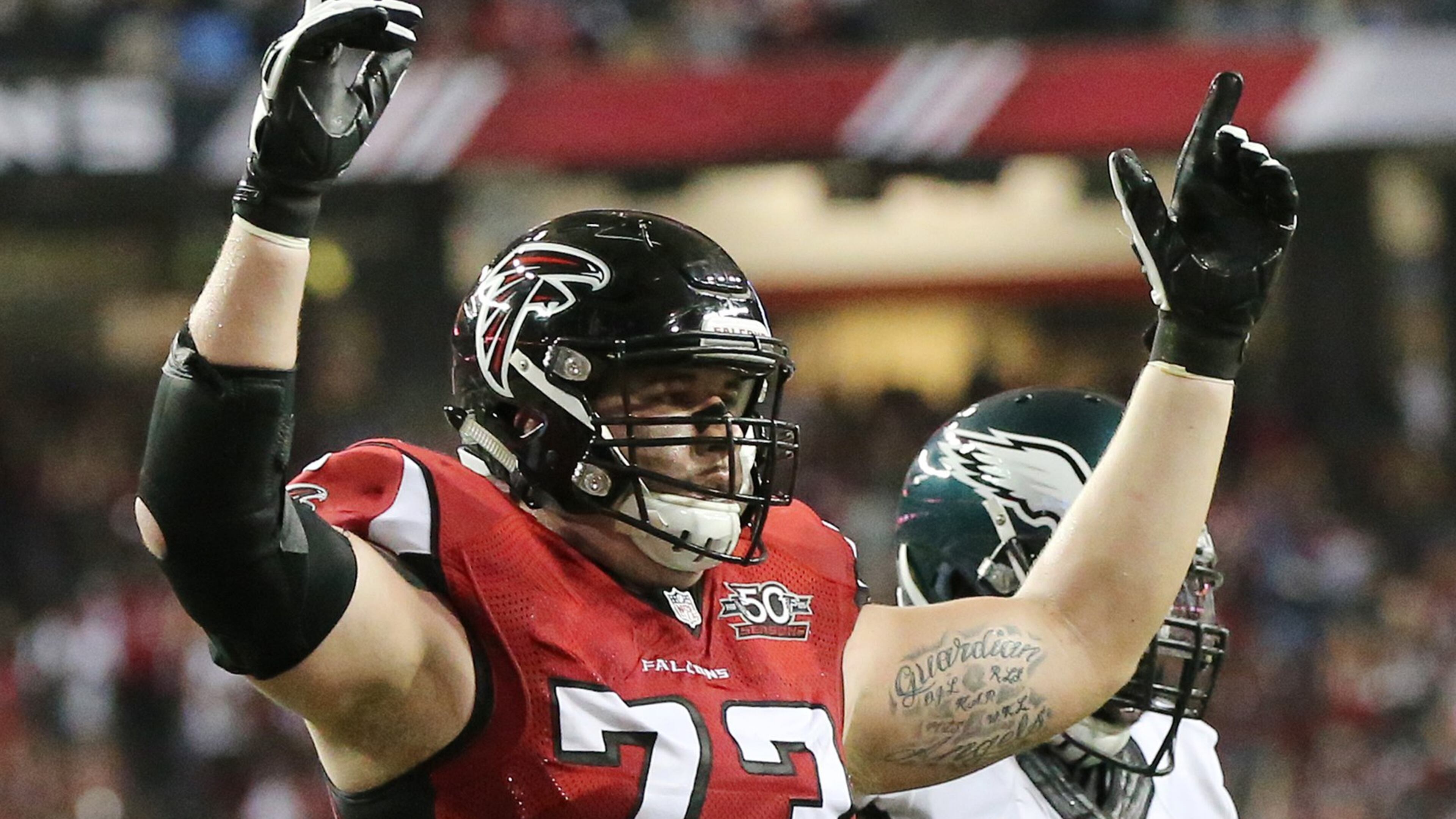 091415 ATLANTA: Falcons offensive lineman Ryan Schraeder signals the touchdown as Julio Jones scores against the Eagles during the second quarter in their Monday Night Football game on Monday, Sept. 14, 2015, in Atlanta. Curtis Compton / ccompton@ajc.com
