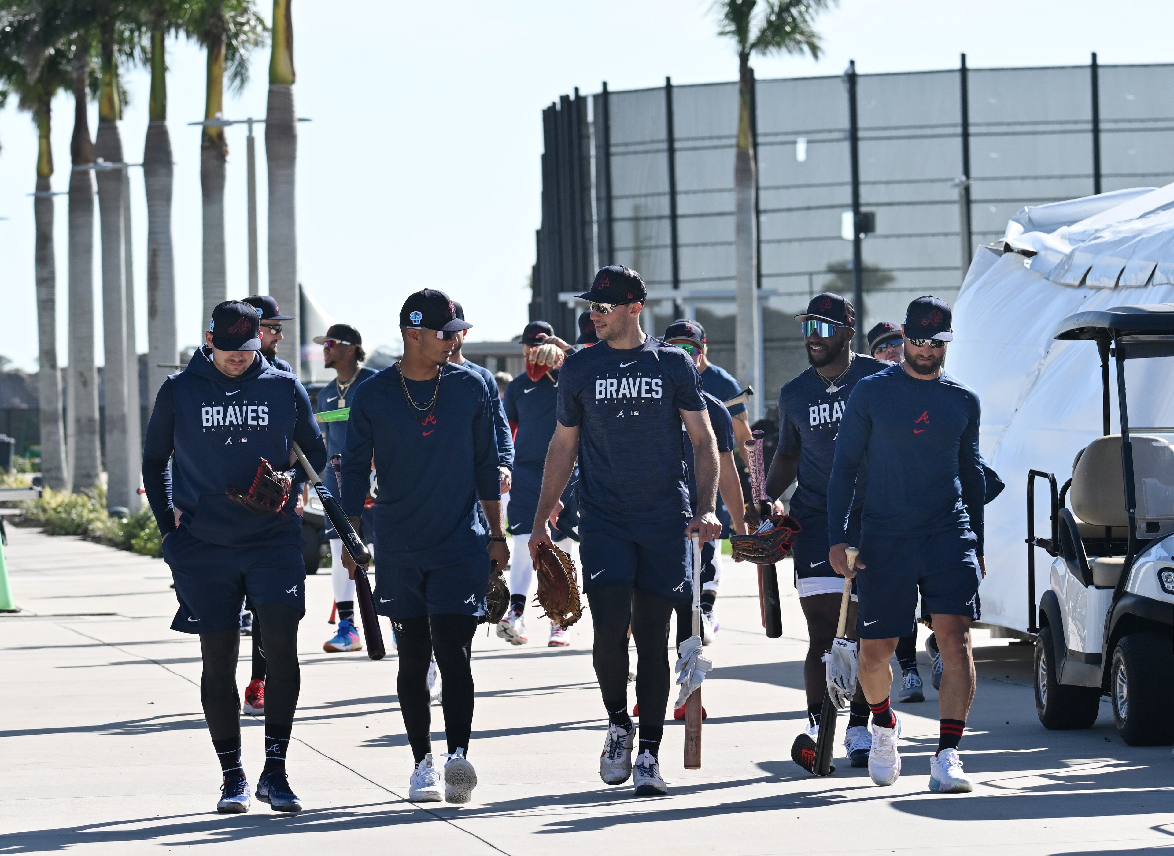 Braves players walk to the stadium for batting practice during spring training Thursday at CoolToday Park in North Port, Florida. (Hyosub Shin / Hyosub.Shin@ajc.com)