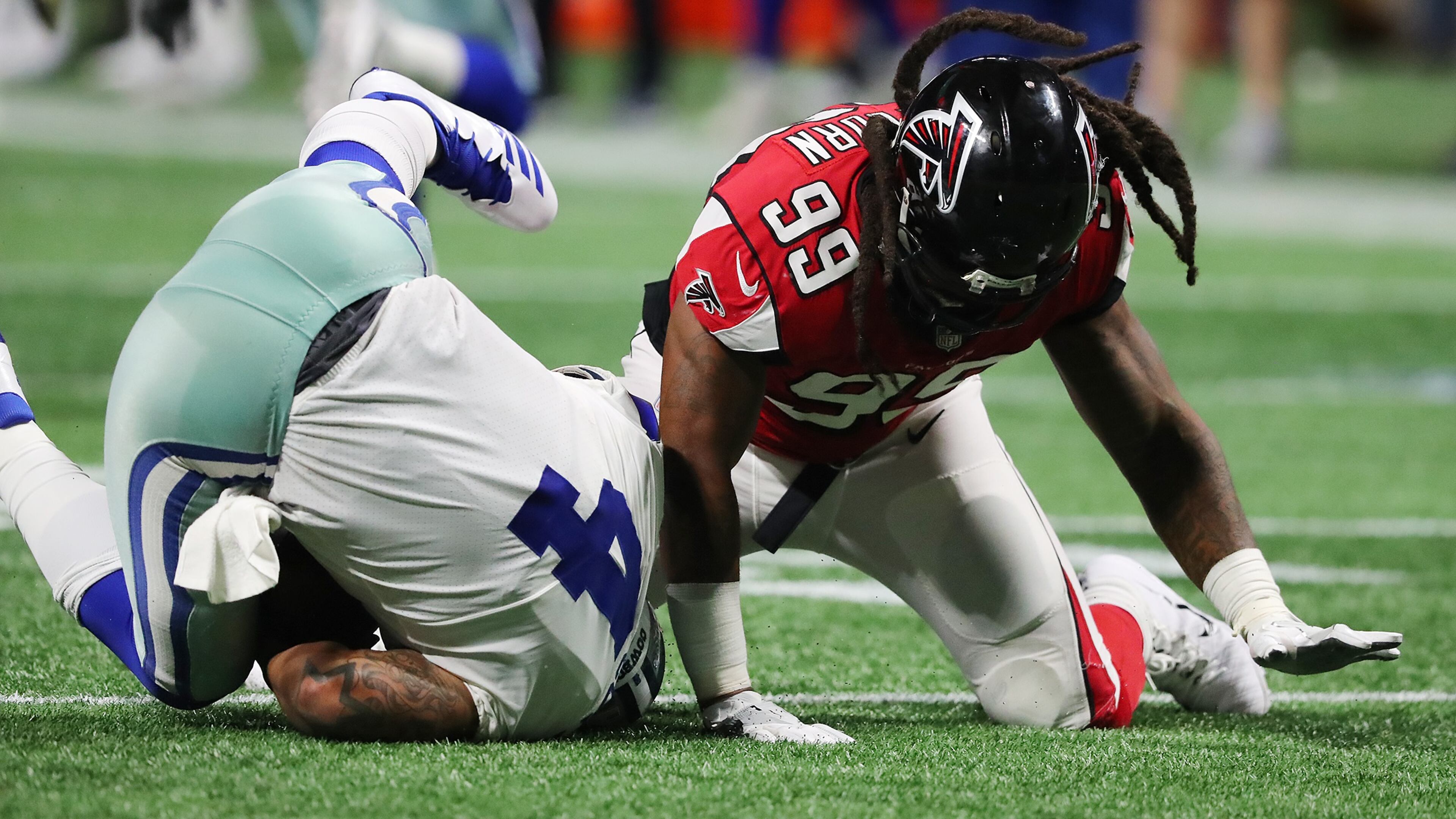November 12, 2017 Atlanta: Falcons defensive end Adrian Clayborn records the fifth sack of Cowboys quarterback Dak Prescott during the second half in a NFL football game on Sunday, November 12, 2017, in Atlanta. The Falcons beat the Cowboys 27-7. Curtis Compton/ccompton@ajc.com
