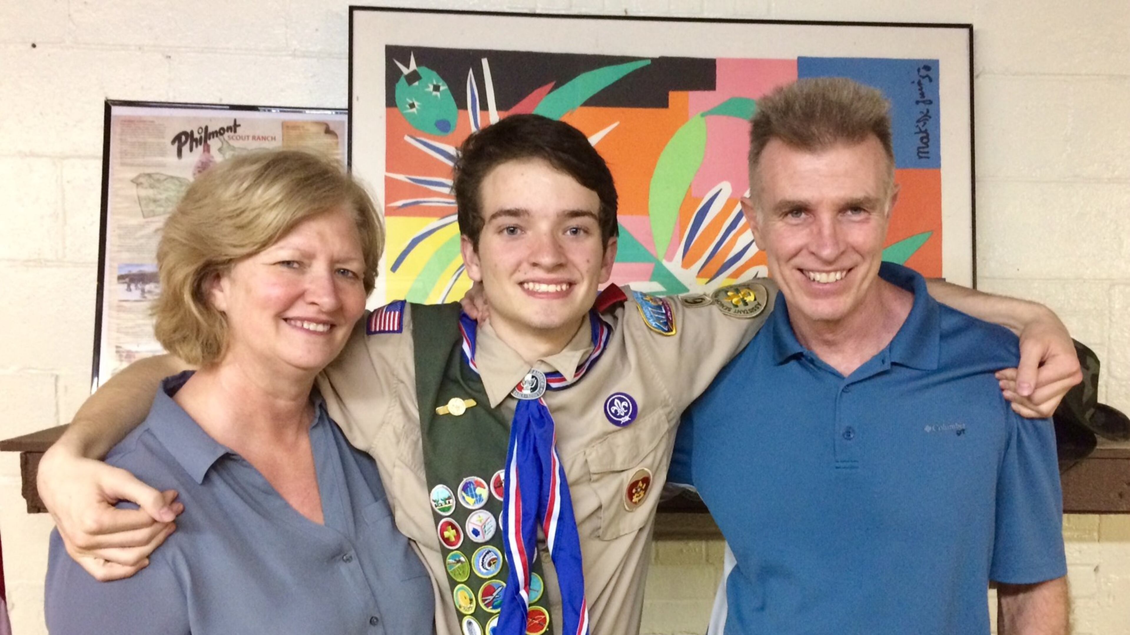 Michael Torpy with his parents after earning the rank of Eagle Scout. The badge was presented to him posthumously. (Photo by Jim Glenister)