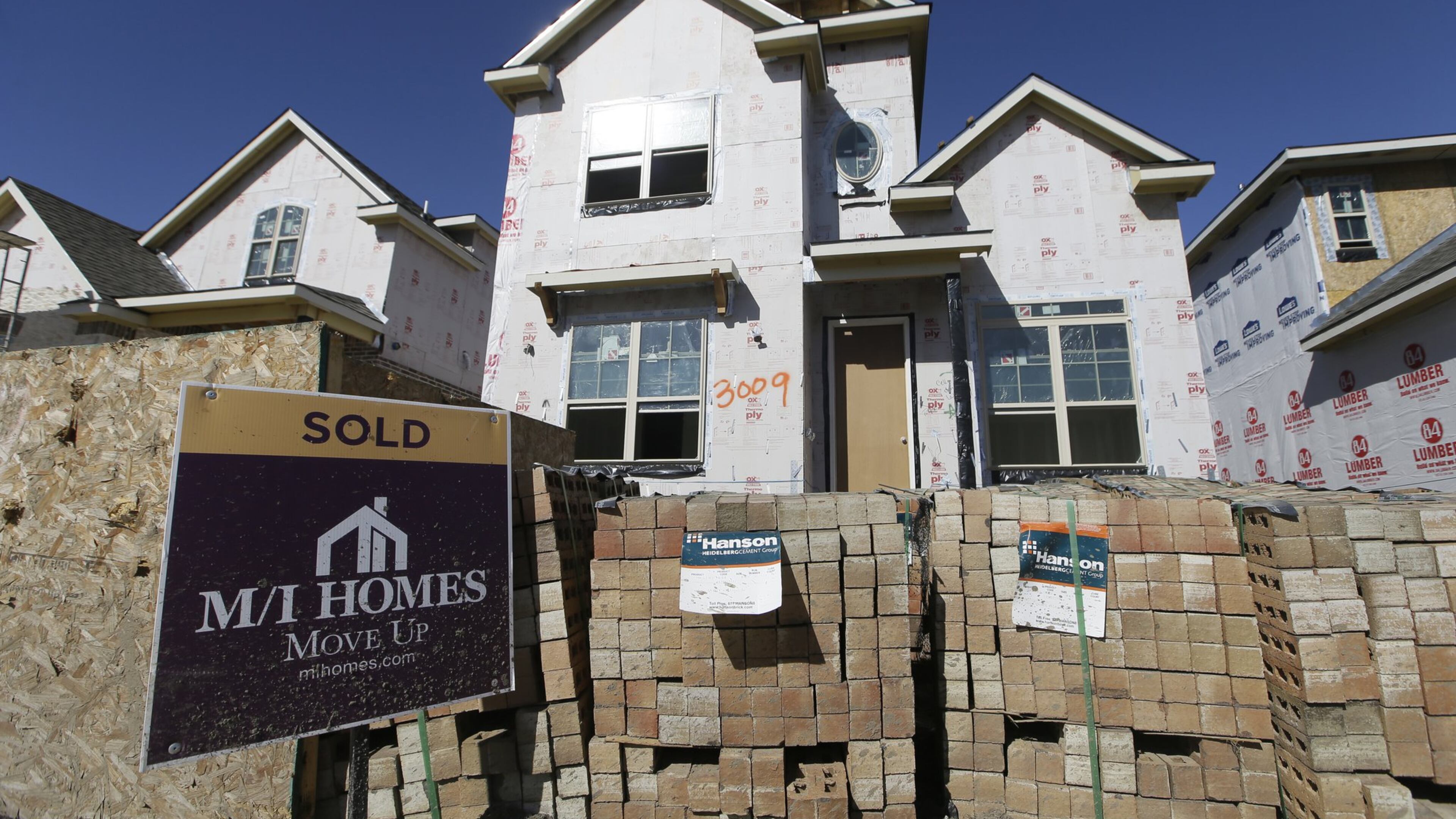 Prices for homes continues to rise with lower-priced homes in short supply. The price of land in metro Atlanta gives builders few incentives to build those starter houses. (AP Photo/LM Otero, File)