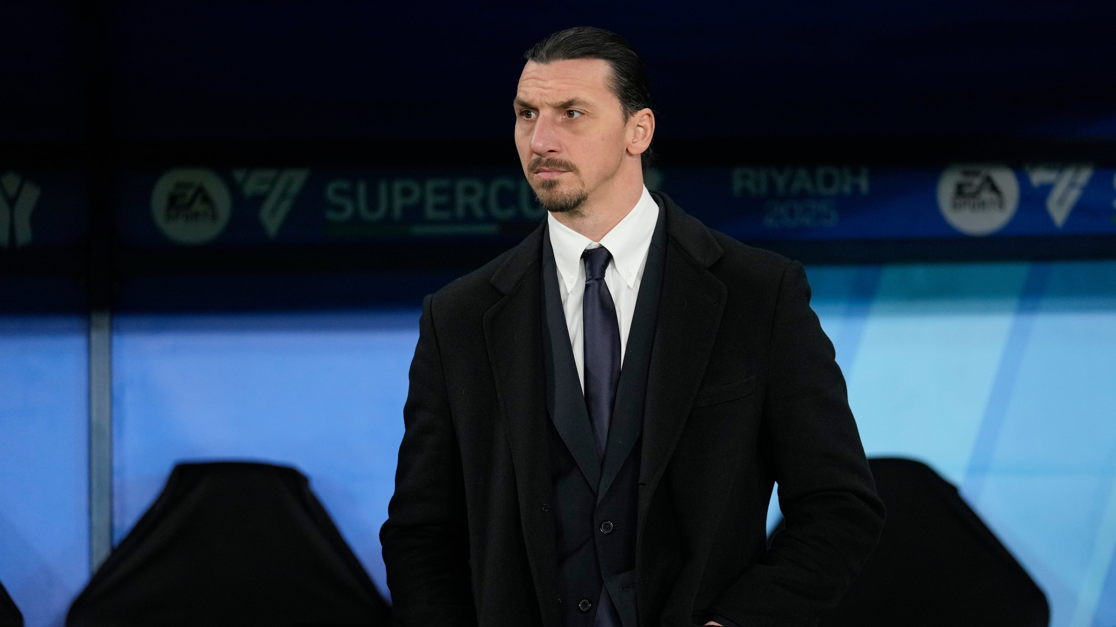 FILE - Former soccer star Zlatan Ibrahimovic stands before the Italian Super Cup semifinal soccer match between Juventus and Milan in Riyadh, Saudi Arabia, Friday, Jan. 3, 2025. (AP Photo/Altaf Qadri, file)