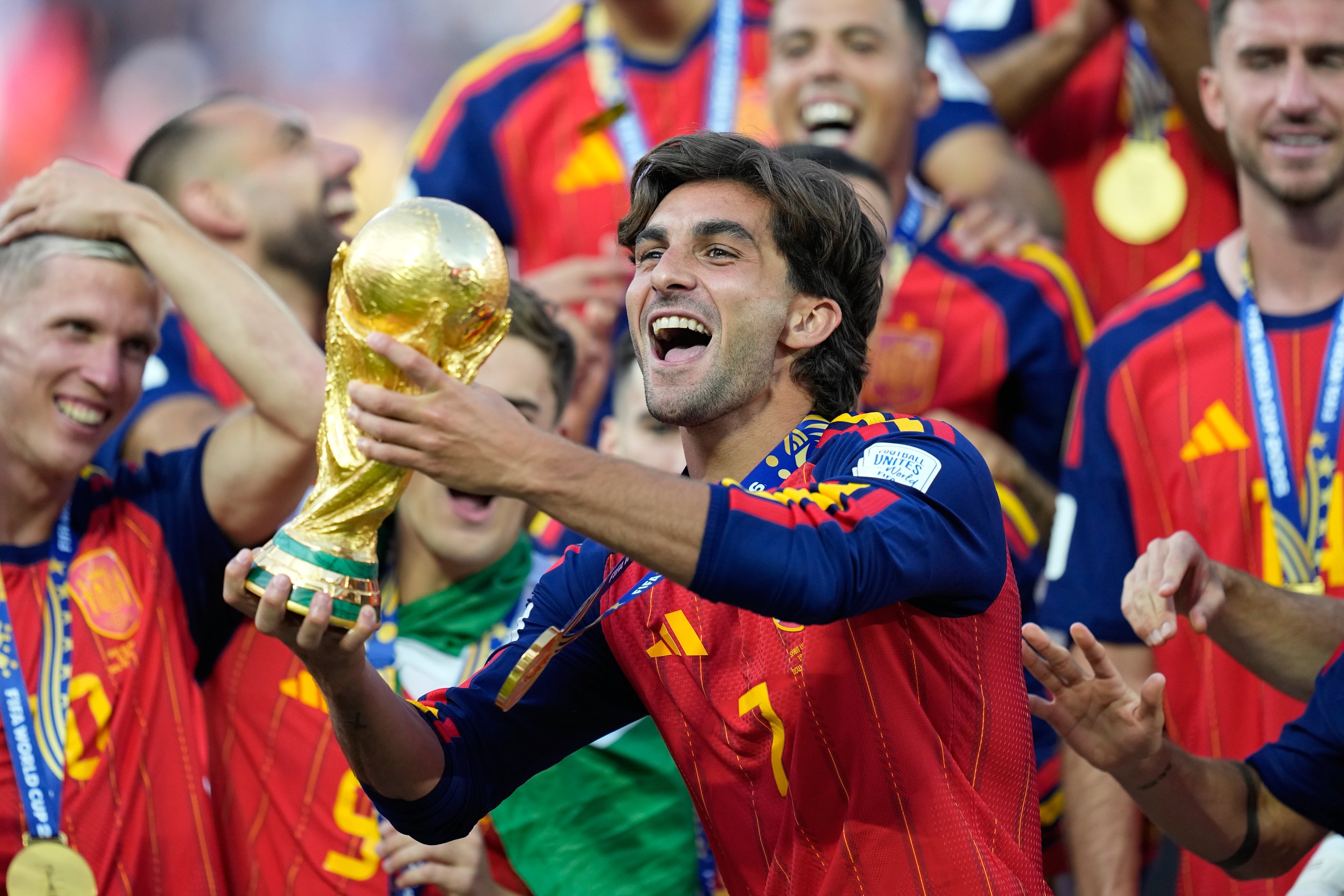 Spain's Ferran Torres celebrates with the trophy after winning the World Cup final soccer match between Spain and Argentina in East Rutherford, N.J., near New York, Sunday, July 19, 2026. (Ashley Landis/AP)