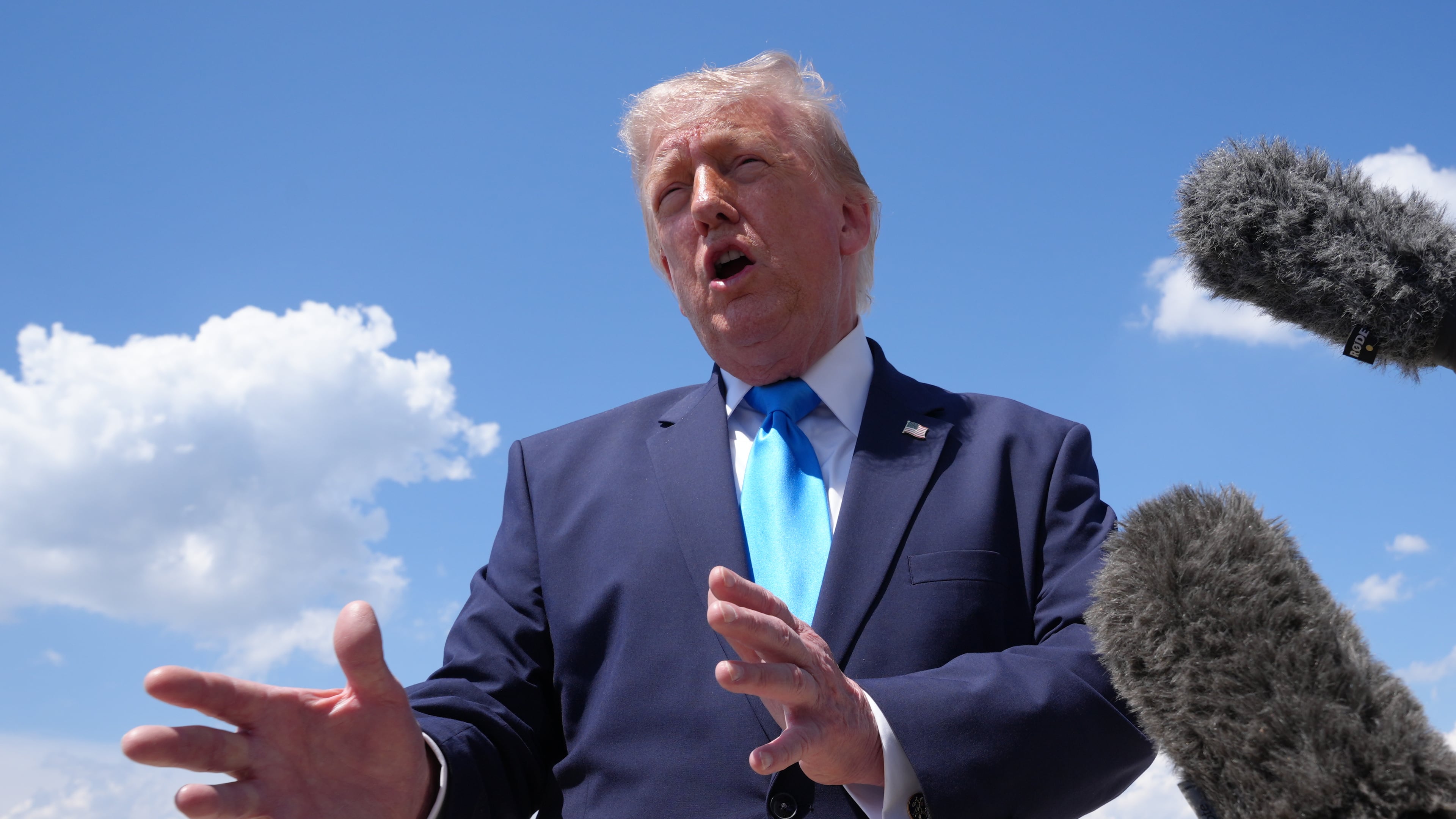 President Donald Trump speaks to the press after returning and stepping off Air Force One, Wednesday, May 20, 2026, at Joint Base Andrews, Md., after speaking at the U.S. Coast Guard Academy commencement. (AP Photo/Jacquelyn Martin)
