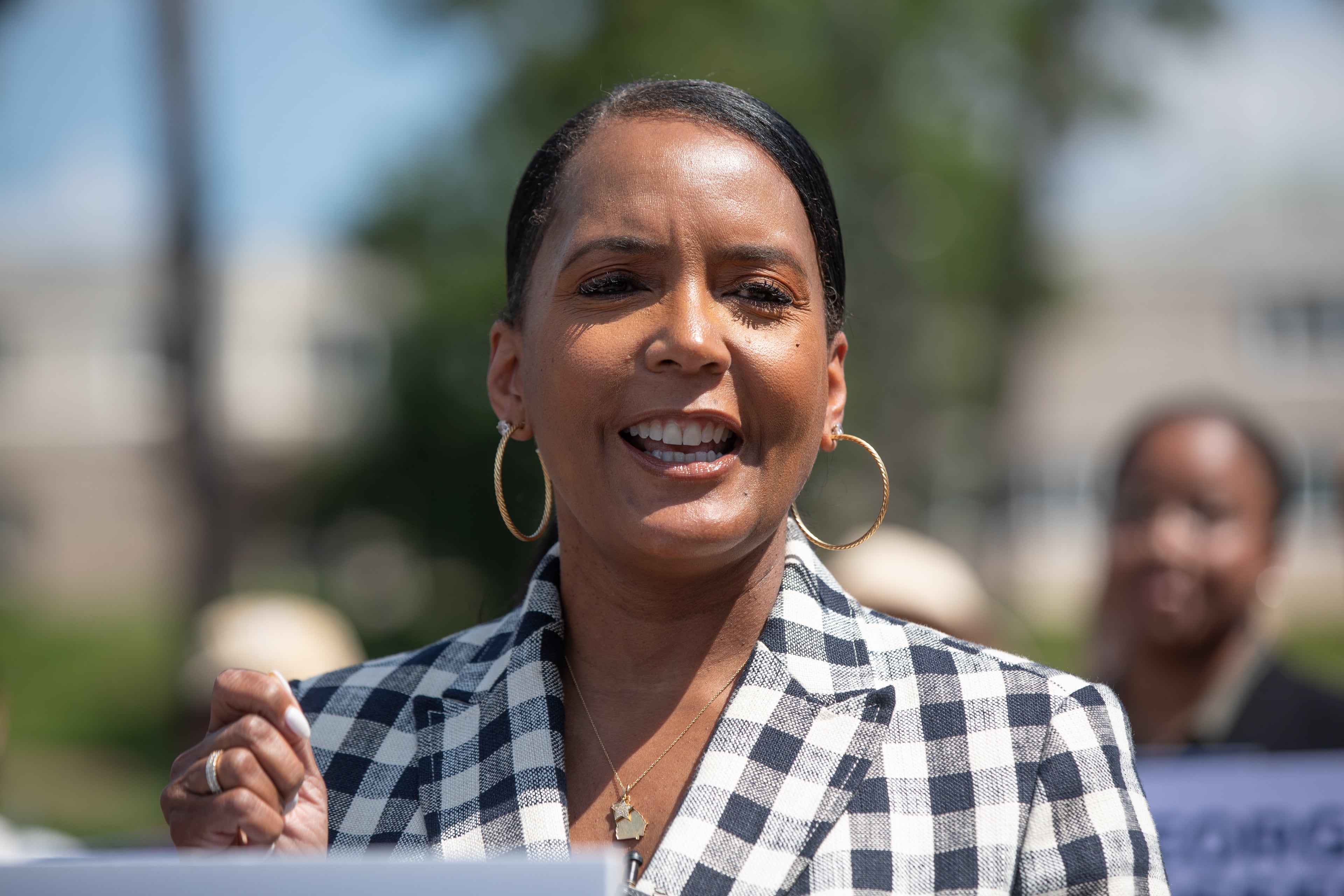 Former Atlanta mayor and Democratic nominee for governor Keisha Lance Bottoms campaigns outside of a shuttered rural hospital in Commerce, Georgia on June 17, 2026. (Riley Bunch/AJC)