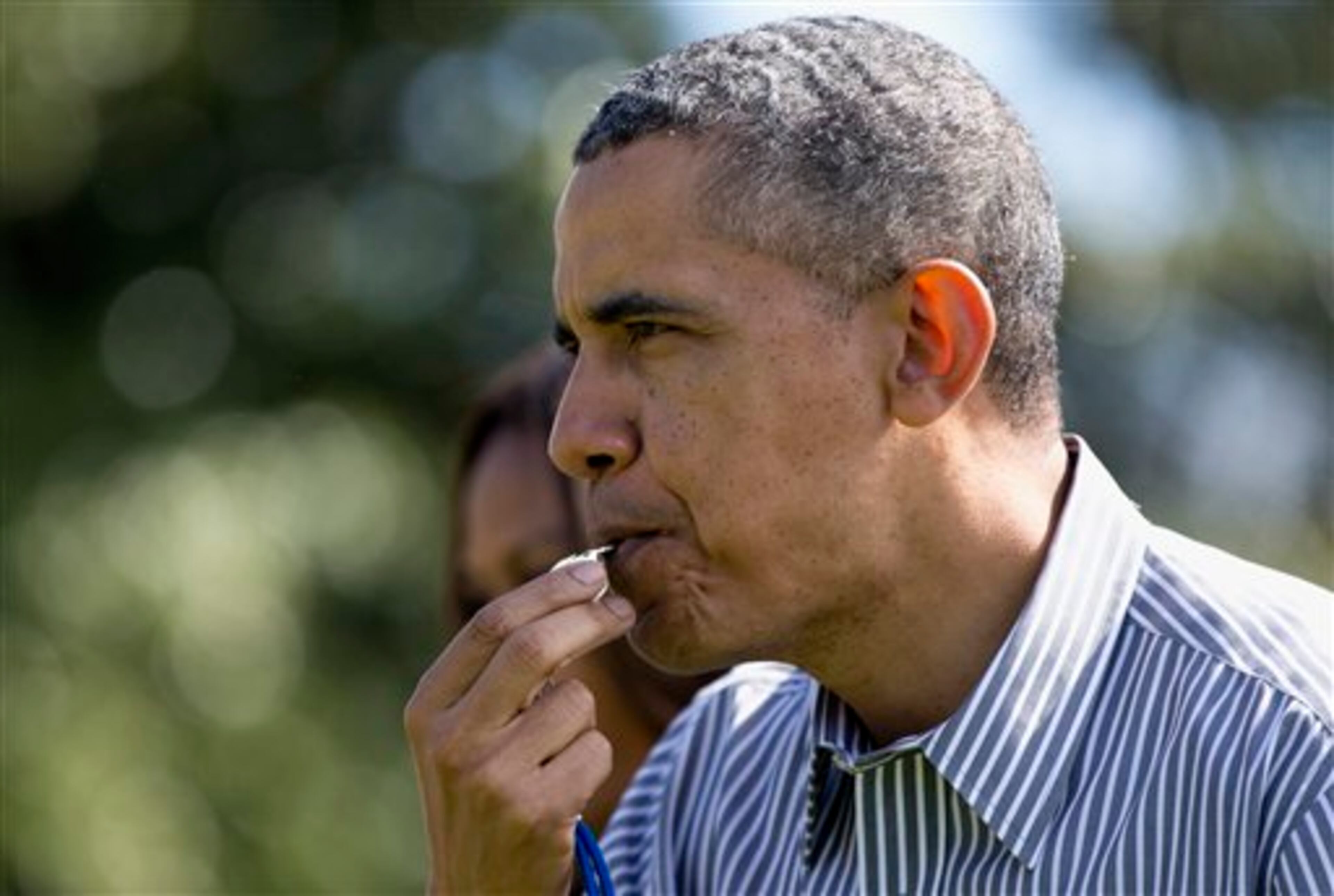 President Barack Obama blows the whistle to start the annual White House Easter Egg Roll, Monday, April 21, 2014, on the South Lawn of the White House in Washington. Thousands of children gathered at the White House for the annual Easter Egg Roll. This year's event features live music, cooking stations, storytelling, and of course, some Easter egg rolling. (AP Photo/Carolyn Kaster)