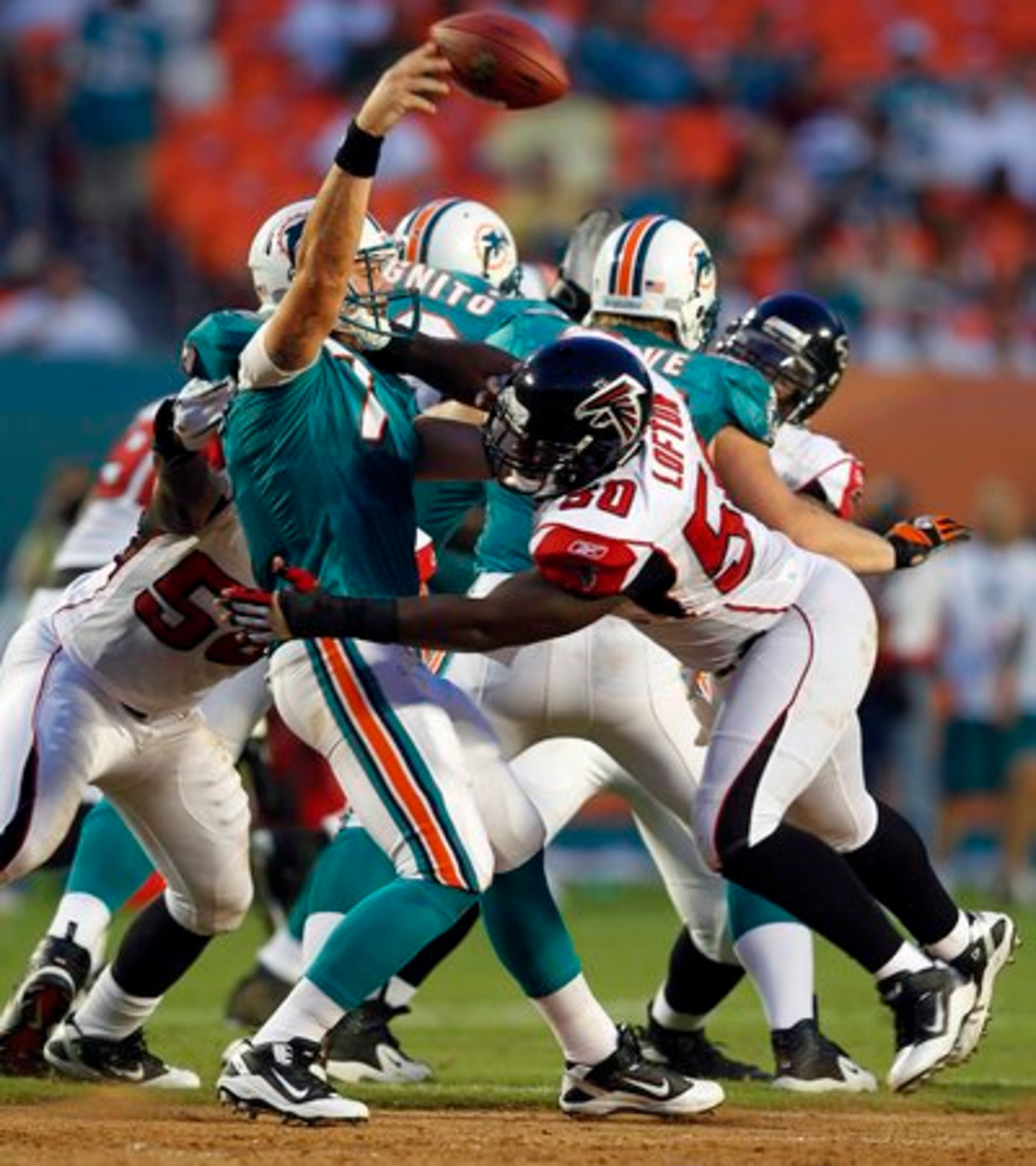 Atlanta Falcons line backer Curtis Lofton (50) forces Miami Dolphins quarterback Chad Henne (7) to throw an incomplete pass during first quarter NFL preseason football action in Miami, Friday, Aug. 27, 2010.