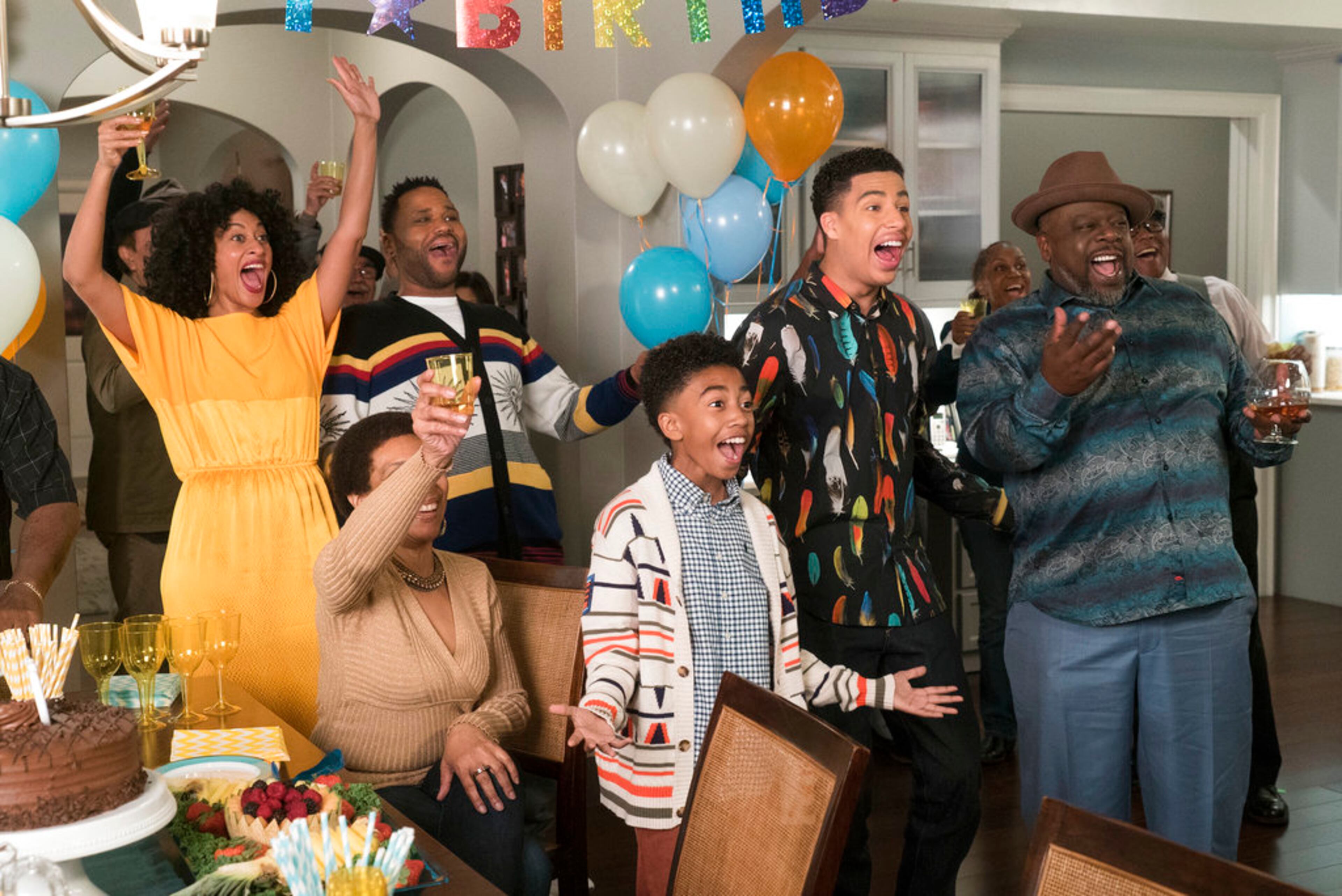 This image released by ABC shows, standing from left, Tracee Ellis Ross, Anthony Anderson, Miles Brown, Marcus Scribner and Cedric the Entertainer in a scene from "black-ish." The program was nominated for an Emmy on Thursday for outstanding comedy series. The 70th Emmy Awards will be held on Monday, Sept. 17. (Ron Tom/ABC via AP)