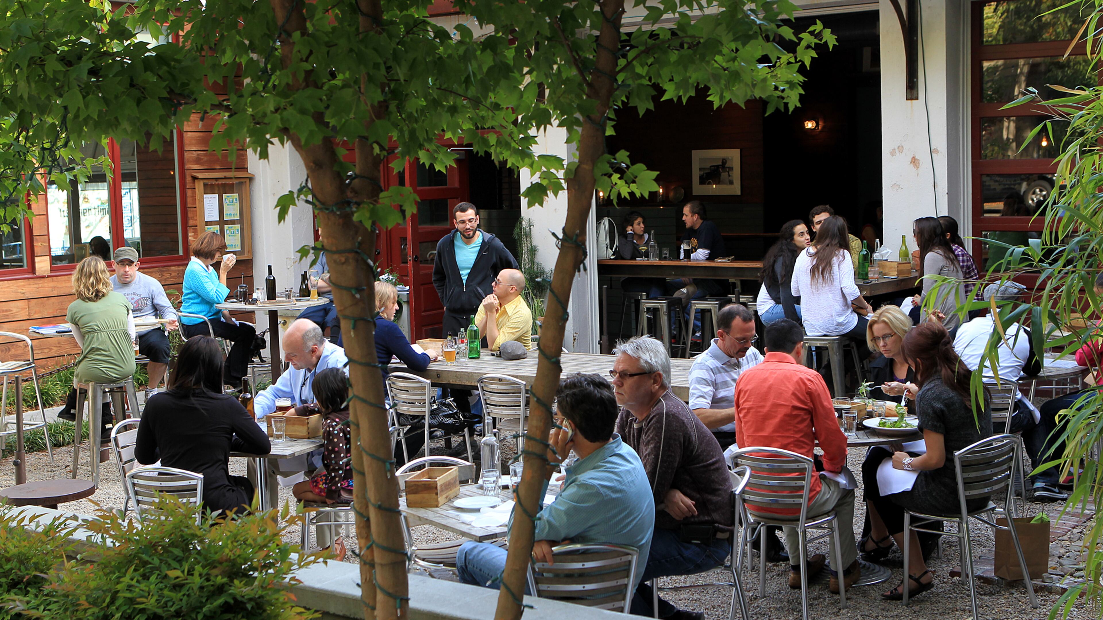 Patio dining: Spring is a great time to eat outside, like these patrons of Leon's Full Service in Decatur.