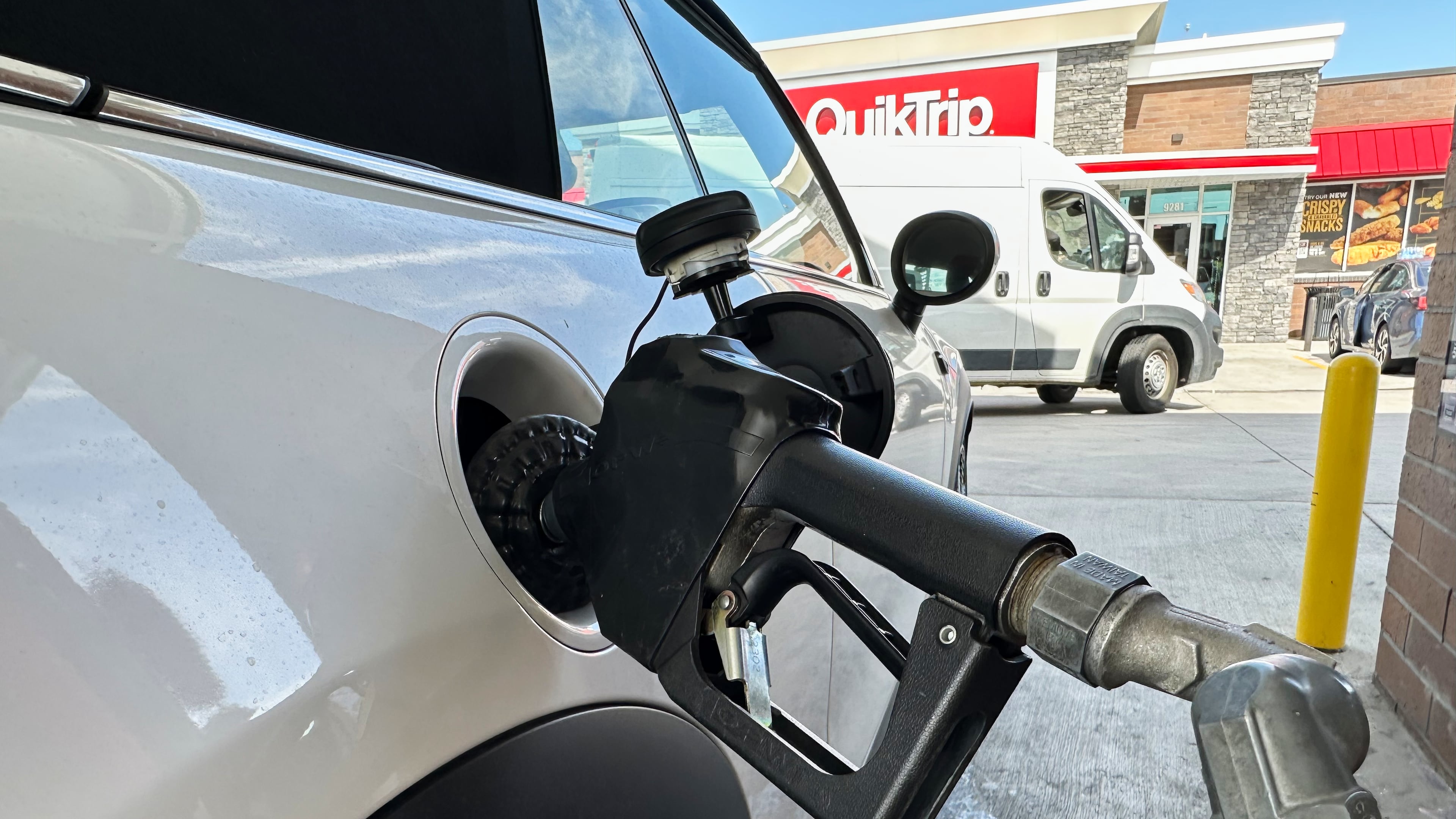 A motorist fills up the fuel tank of a vehicle at a QuikTrip gasoline stop Tuesday, Sept. 15, 2026, in Greenwood Village, Colo. (AP Photo/David Zalubowski)