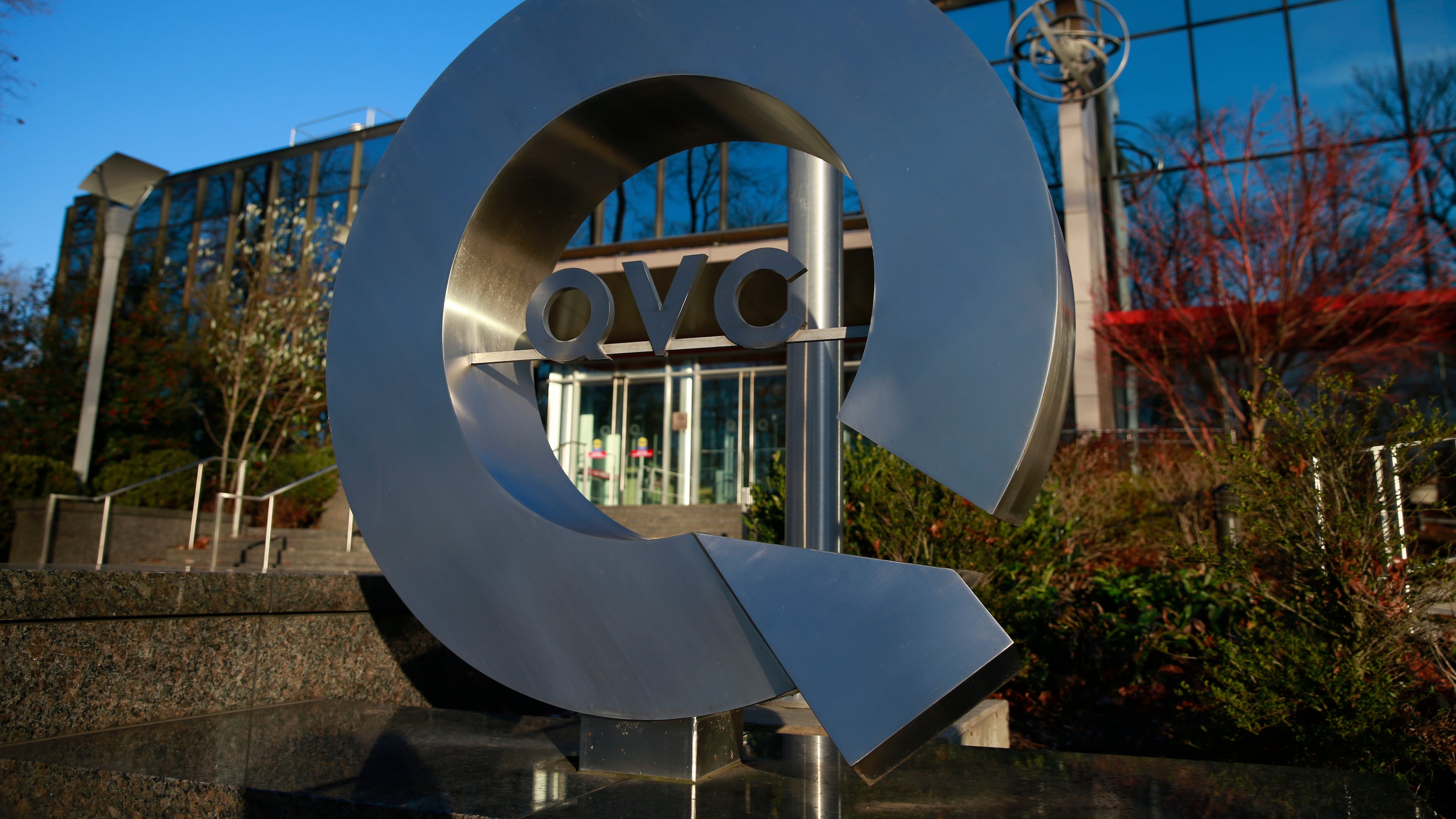 FILE - In this Monday, Jan. 5, 2015 photo shown is a sign at a QVC facility in West Chester, Pa. (AP Photo/Matt Rourke, File)