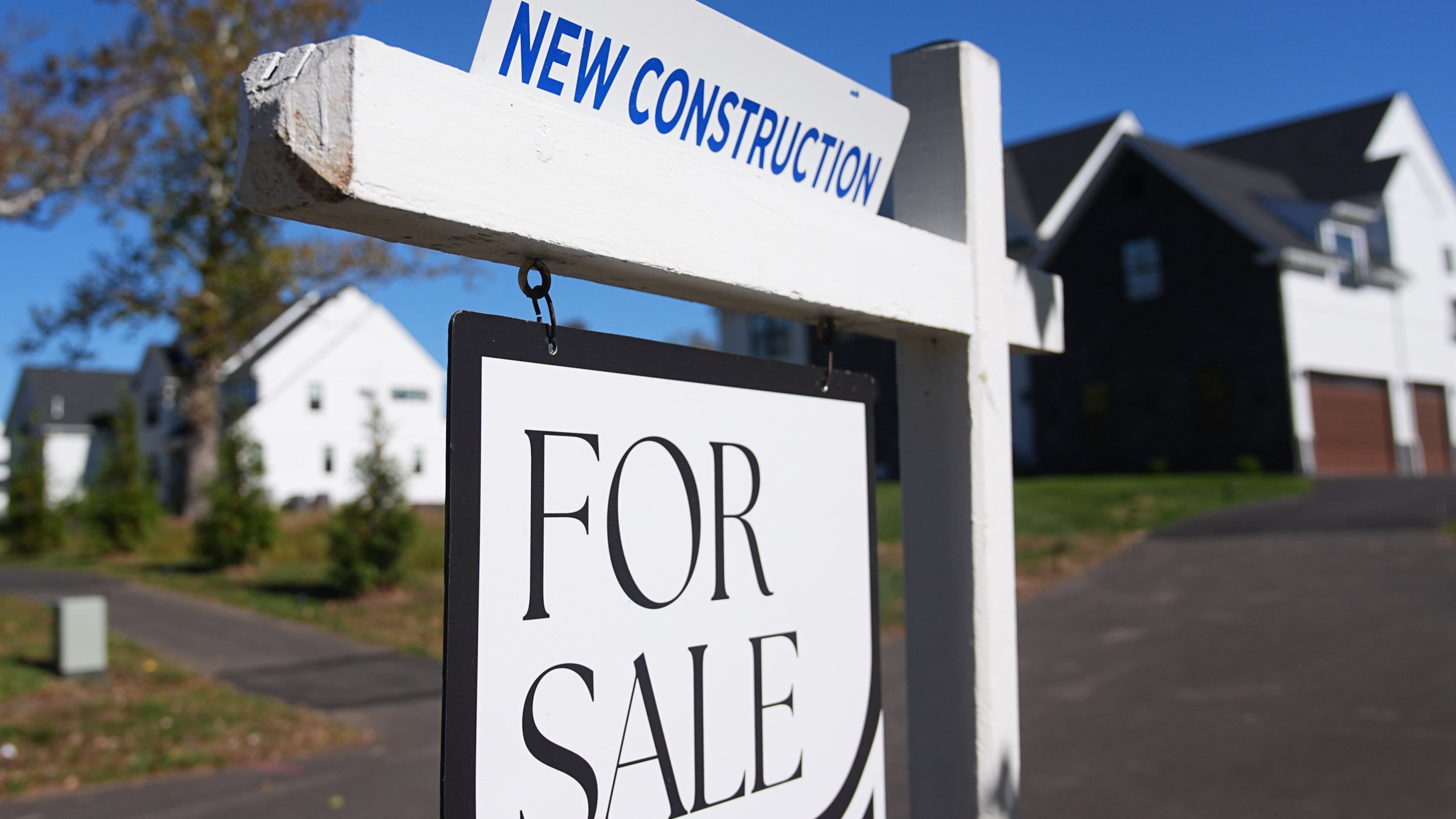 FILE - A sign is posted for a new home for sale in Ambler, Pa., Oct. 16, 2025. (AP Photo/Matt Rourke, File)