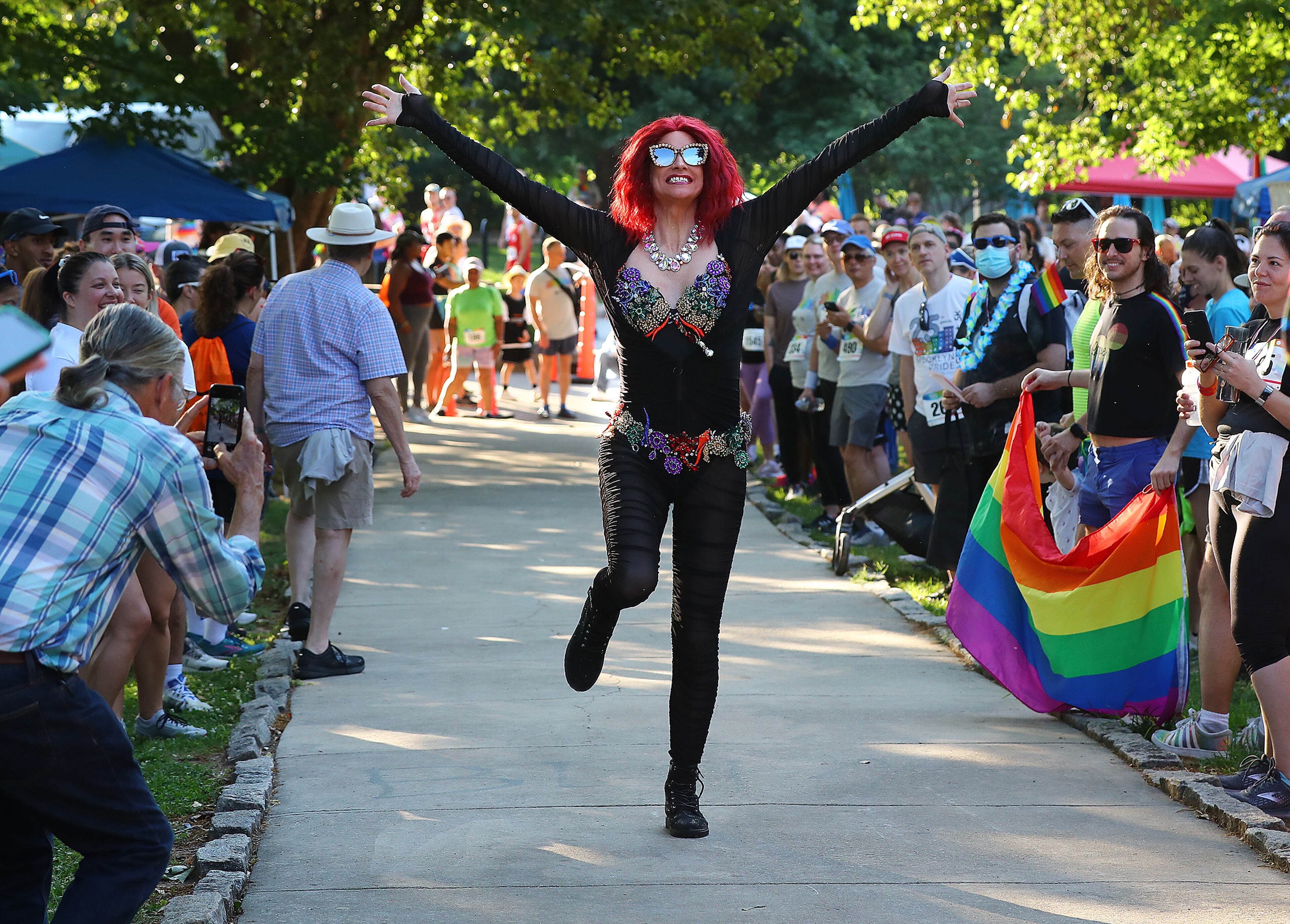 Hostess Nicole Paige Brooks performs to entertain participants gathering for the start of the Atlanta Pride Run at Piedmont Park on Sunday, June 5, 2022, in Atlanta. June is Pride Month and the Atlanta Pride Run theme for 2022, Stronger Together, is spotlighting LGBTQ+ communities. “Curtis Compton / Curtis.Compton@ajc.com”