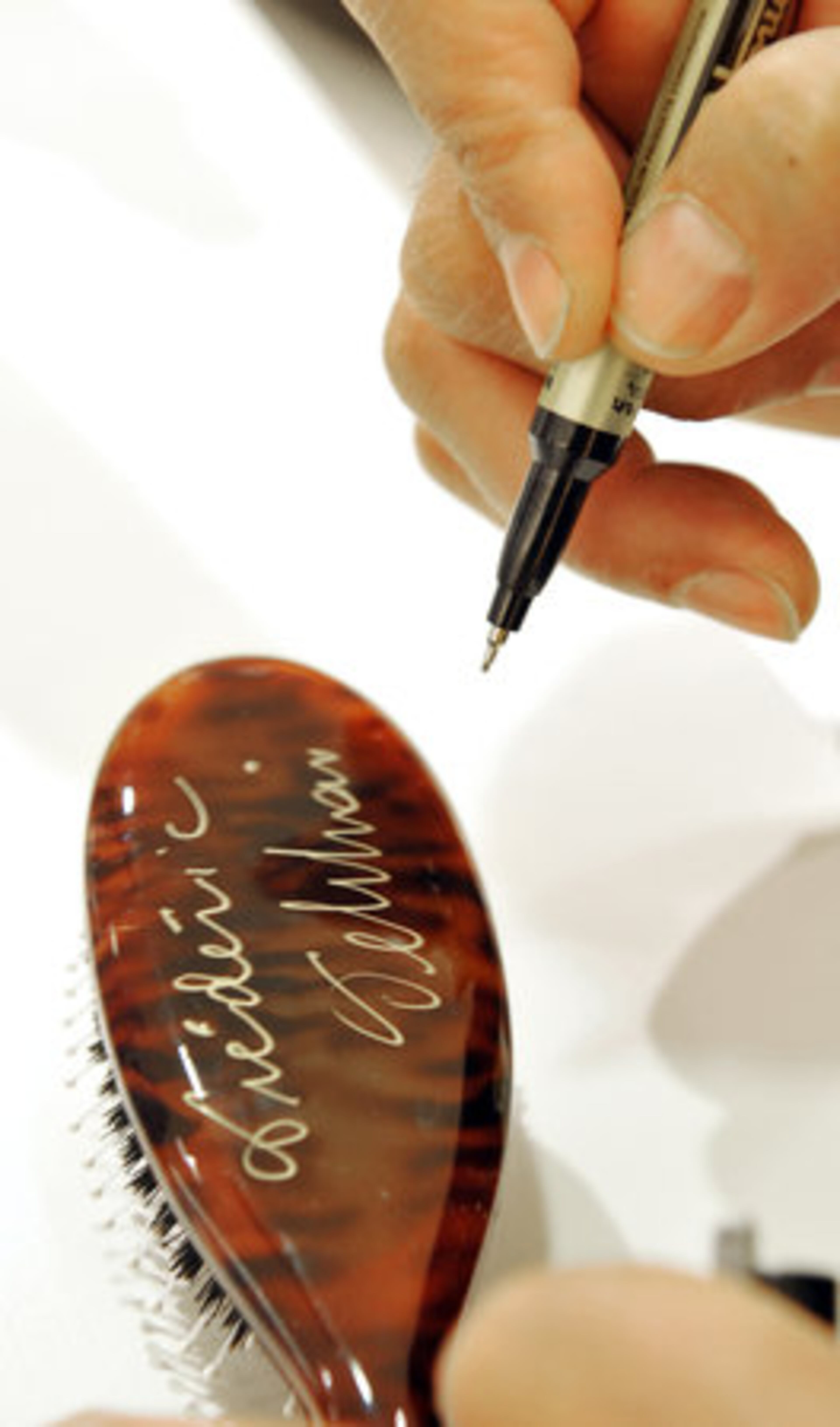 For the holidays, Fekkai suggests trying something different. "It's important to play with your hair and be festive," he said. Use an elastic band to create a simple updo but make it special by adding a spritz of his Spray On Hair Crystals, which come in champagne, copper and bronze, $18.50.