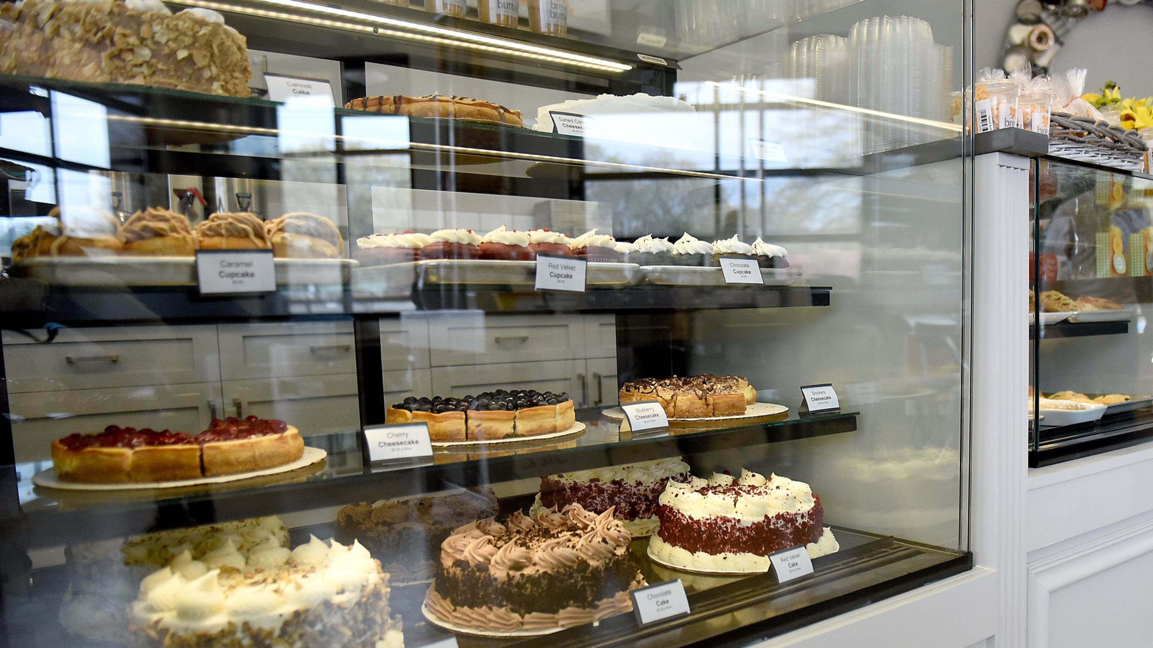 The bakery case at Bread & Butter Bakery at Marietta Square Market has plenty of ways to tempt you. RYON HORNE/RHORNE@AJC.COM