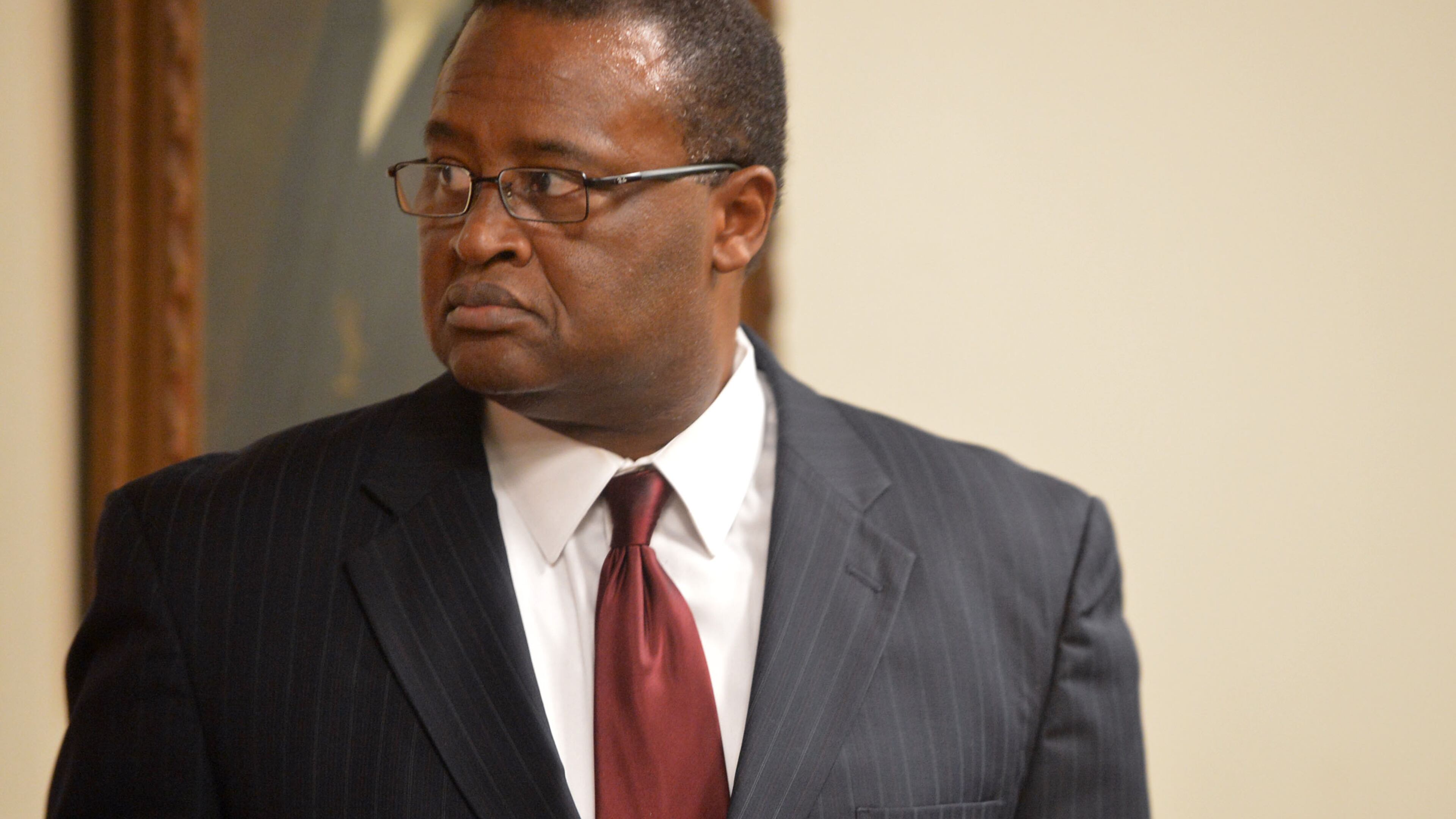 Former schools Superintendent Crawford Lewis pleaded guilty to misdemeanor obstruction under a deal with prosecutors...