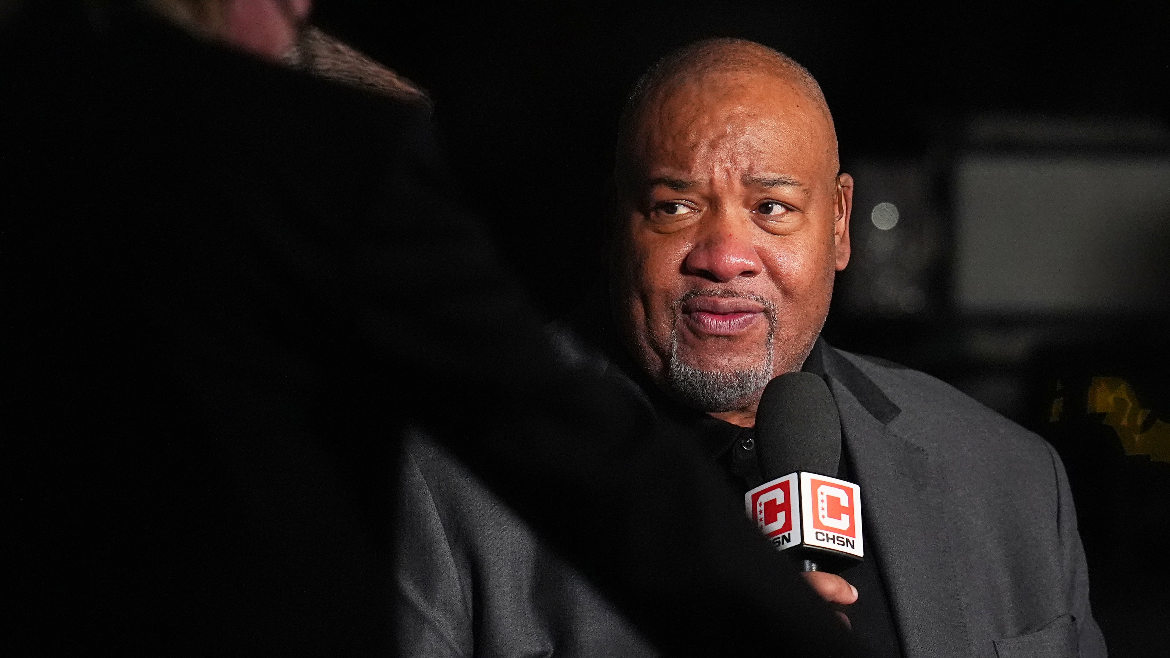 FILE - Chicago Bulls television announcer Stacey King attends the first half of an NBA basketball game, Nov. 17, 2025, in Denver. (AP Photo/David Zalubowski, File)
