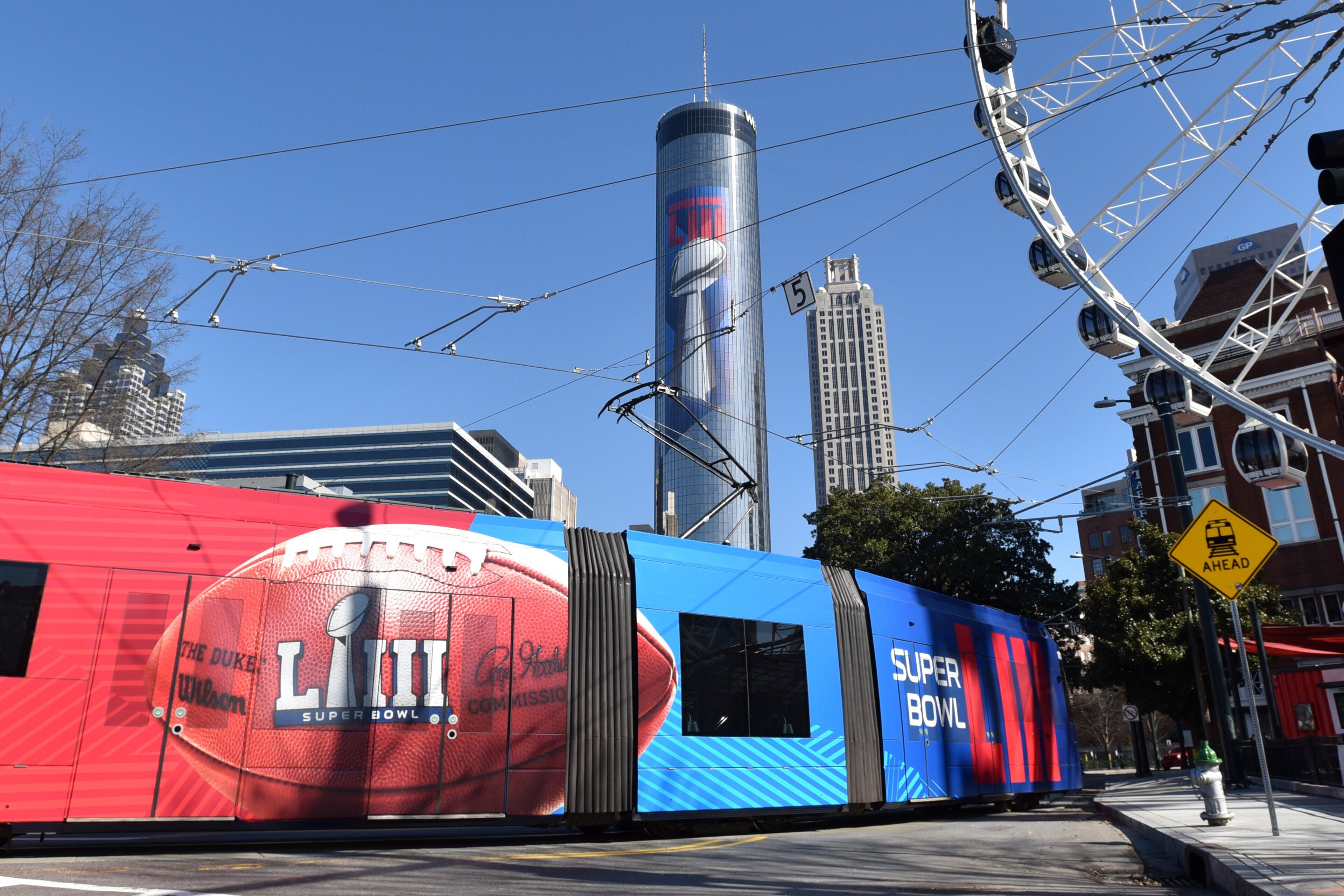 January 16, 2019 Atlanta - The Atlanta Street Car displays a Super Bowl LIII advertisement near Centennial Olympic Park in downtown Atlanta on Wednesday, January 16, 2019. Atlanta faces a test on Super Bowl Sunday and the question with less than a month to go before the big game is this: Is the city ready? The city budgeted some $10 million last year for police, fire and other items to assist with the big game. HYOSUB SHIN / HSHIN@AJC.COM