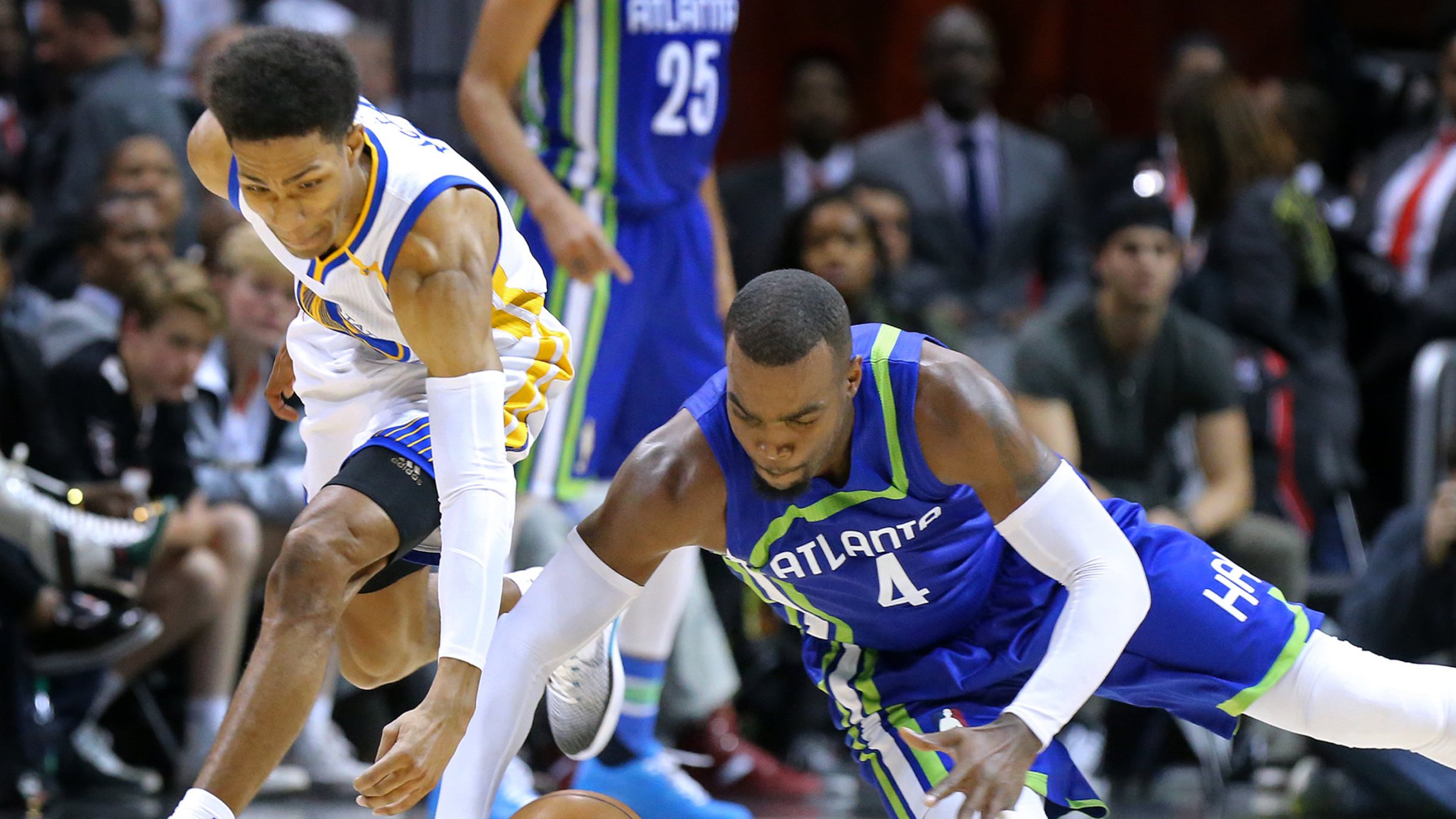 Hawks’ Paul Millsap and Warriors’ Patrick McCaw go after a loose ball during the second half in a NBA basketball game on Monday, March 6, 2017, in Atlanta. Curtis Compton/ccompton@ajc.com