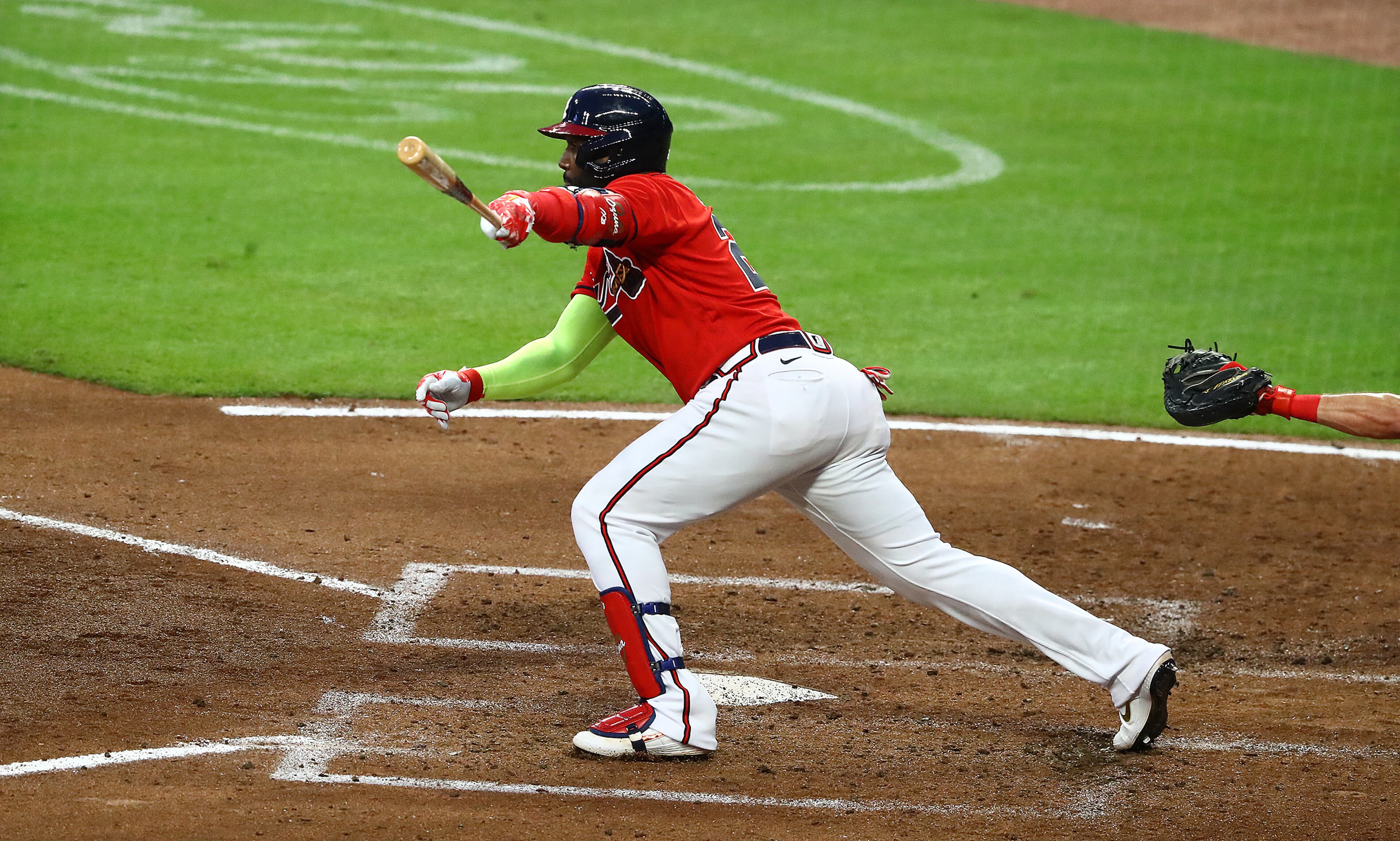 Atlanta Braves' Marcell Ozuna rips a RBI single against the Philadelphia Phillies to cut the lead to 4-3 during the third inning in a MLB baseball game on Sunday, August 23, 2020 in Atlanta. Curtis Compton ccompton@ajc.com