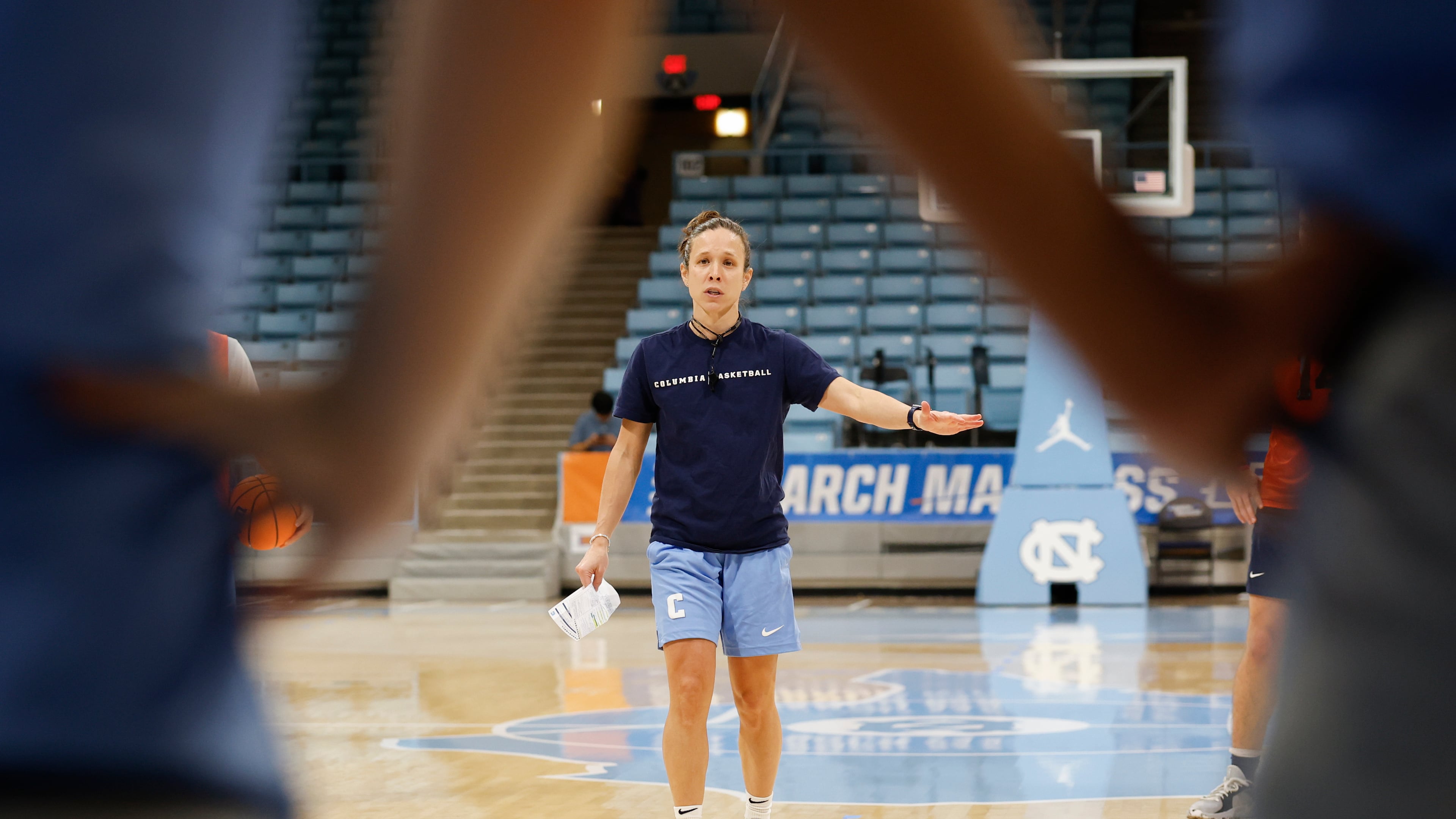 FILE - Columbia head coach Megan Griffith talks to her team during NCAA college basketball practice in Chapel Hill, N.C., March 19, 2025. (AP Photo/Nell Redmond, File)