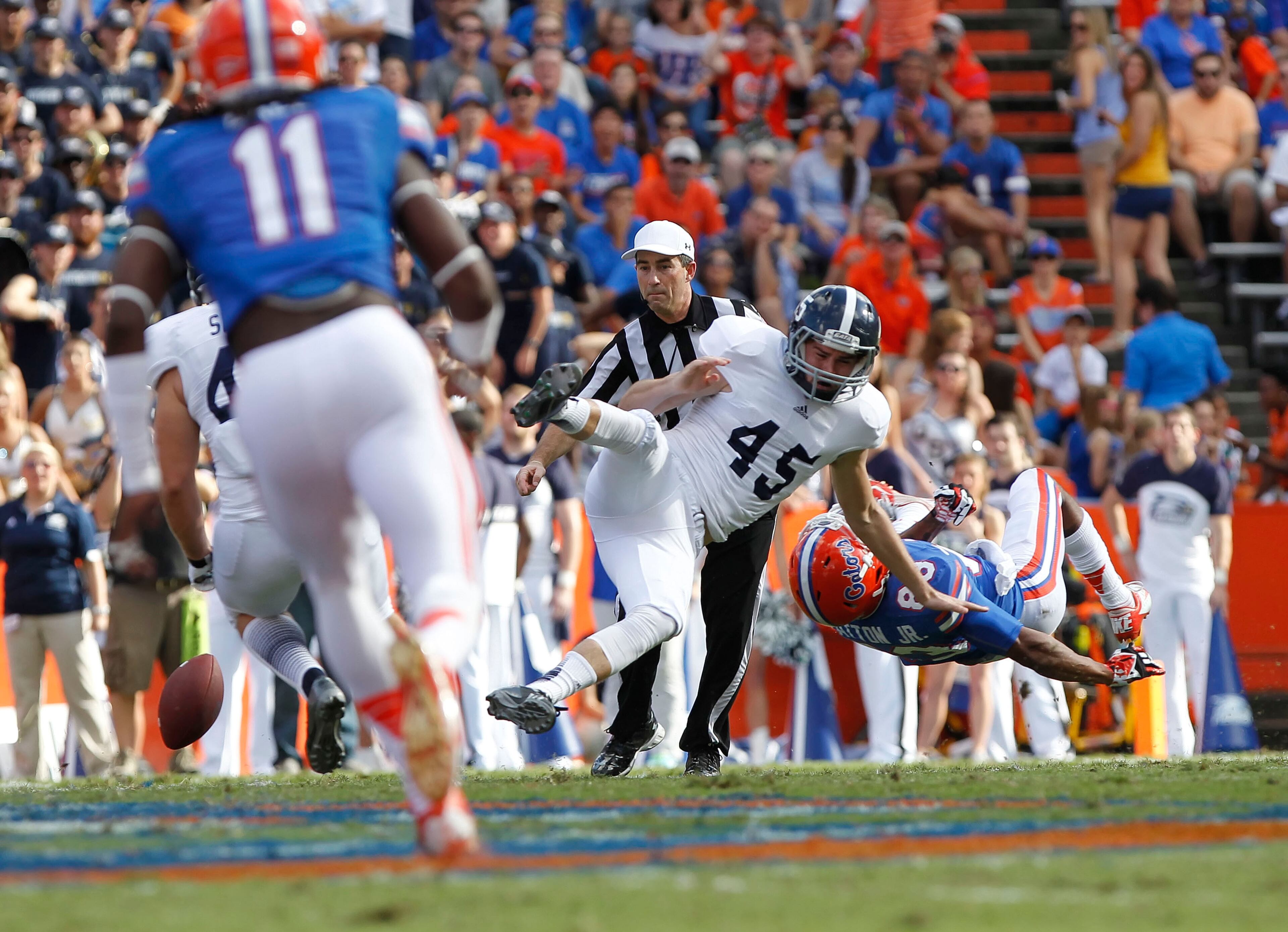Florida Gators wide receiver Solomon Patton (83) pressures Georgia Southern Eagles punter Luke Cherry (45) after missing the snap during the first quarter at Ben Hill Griffin Stadium. Mandatory Credit: Kim Klement-USA TODAY Sports