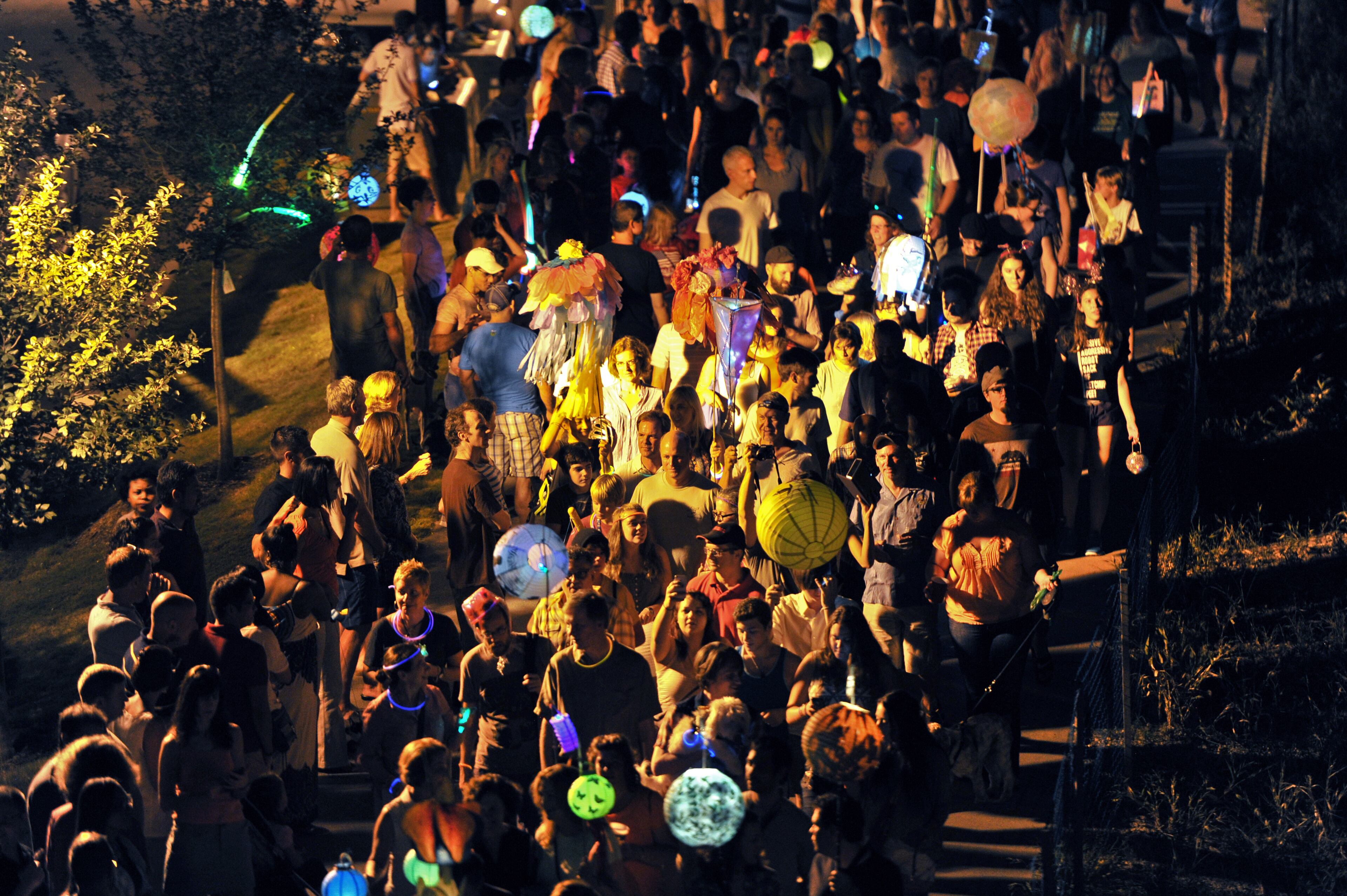 Hundreds of parade participants float on the Eastside Trail of the Atlanta BeltLine during the 2013 Atlanta BeltLine Lantern Parade on Sept. 7, 2013.